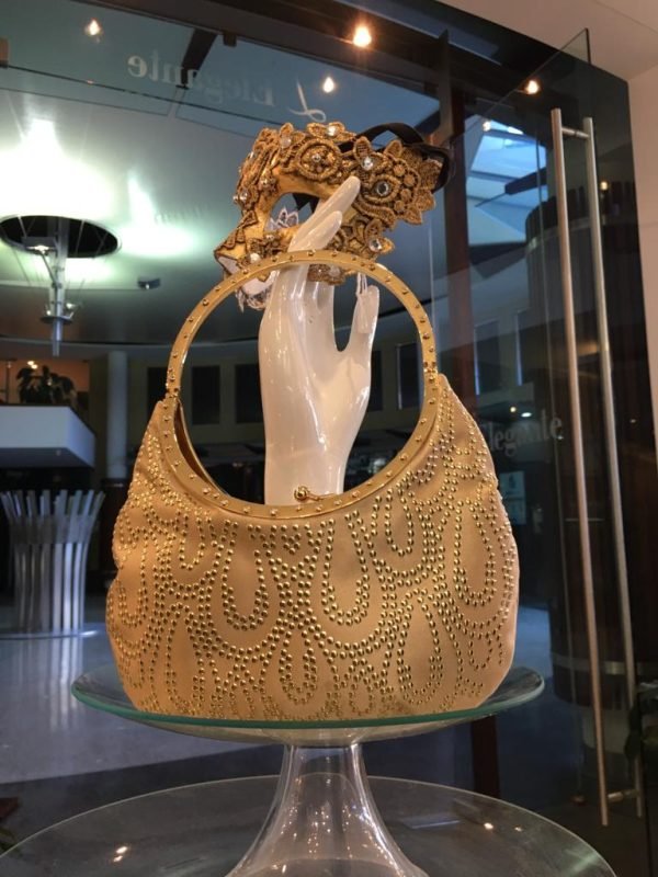 Valentino silk studded with gold studs beautiful swarovsky crystals inbeded in handles