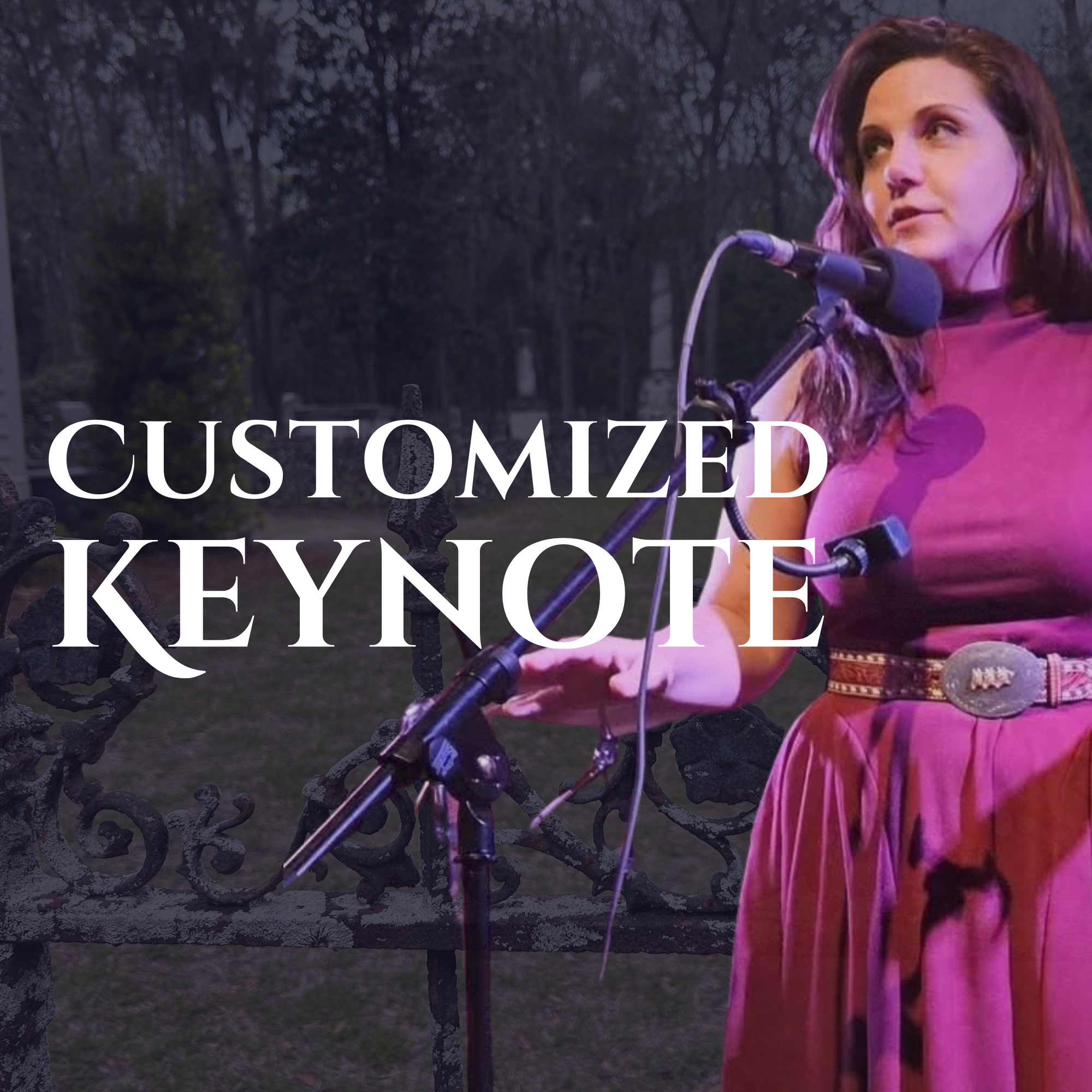 Liz Z Pardue dressed in pink, standing outdoors at dusk, speaking into a microphone, with a decorated metal fence and trees in the background.