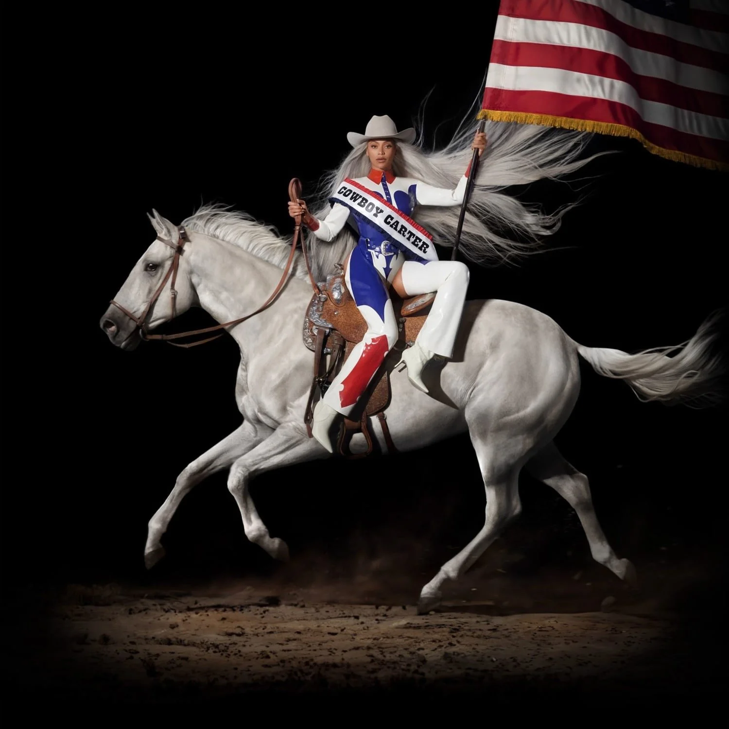 A woman dressed in a cowboy costume riding a white horse, holding an American flag, with a sash that says 'Cowboy Carter' on a dark background.