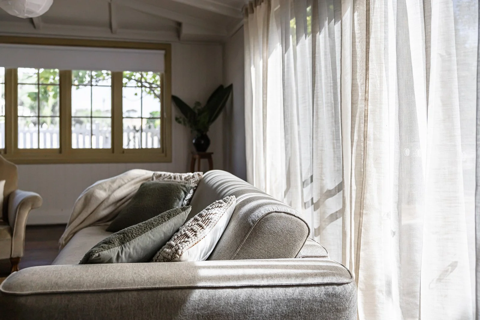Sunshine streaming through curtains at Sunny Hill