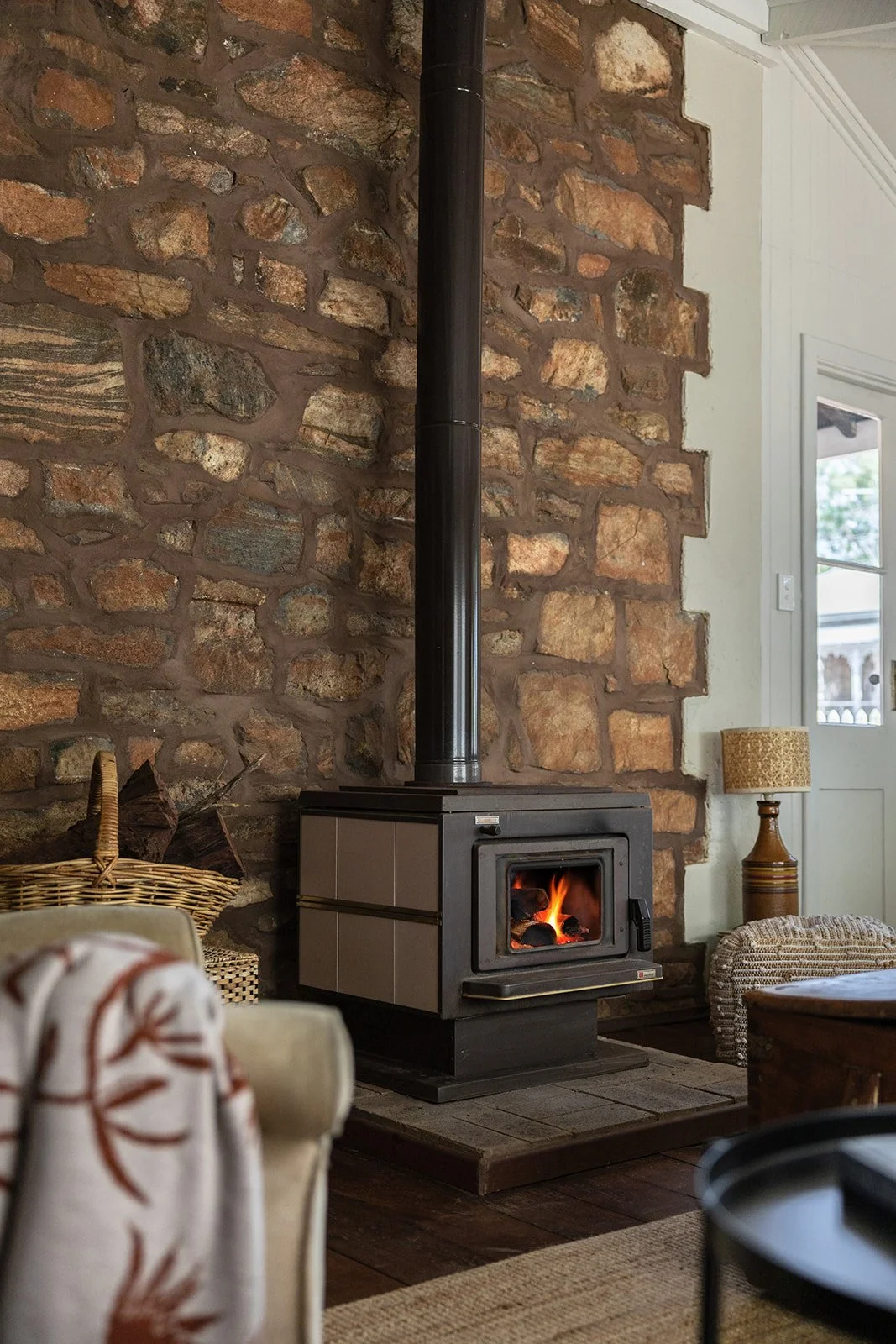 The pot belly burning in the lounge room at Sunny Hill