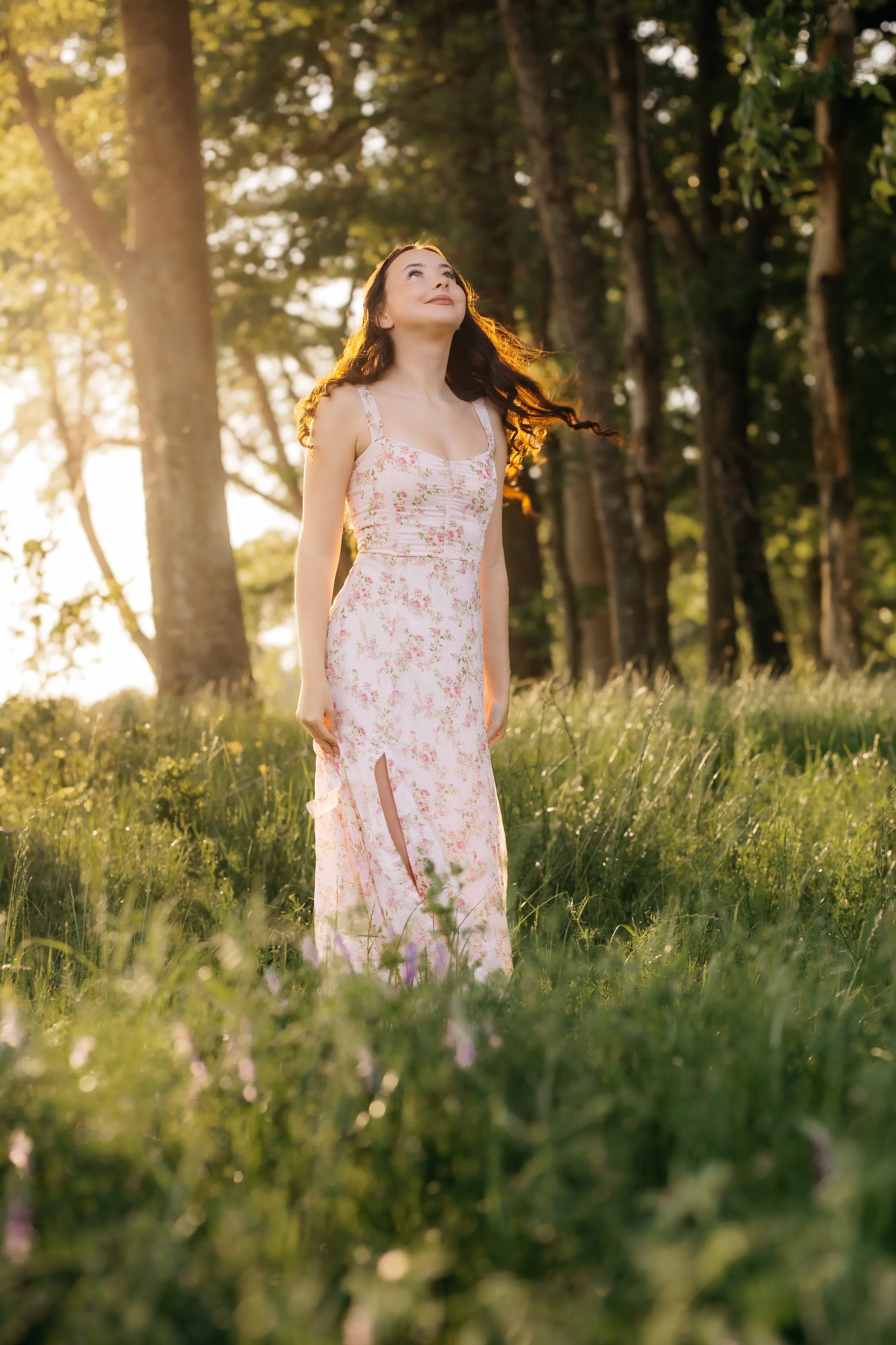 Senior portrait in a wildflower field at golden hour in Athens, Georgia