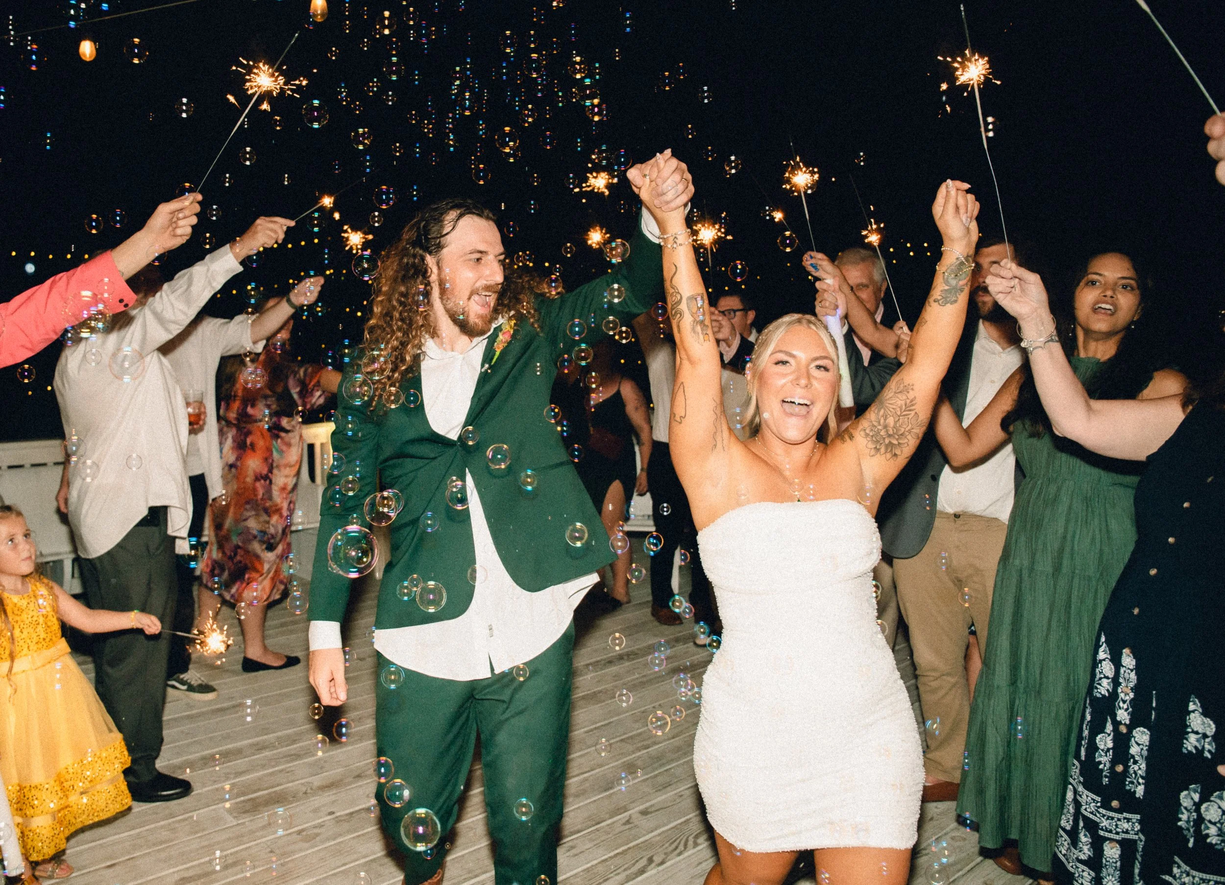 Bride and groom at bubble exit at Charlotte wedding venue