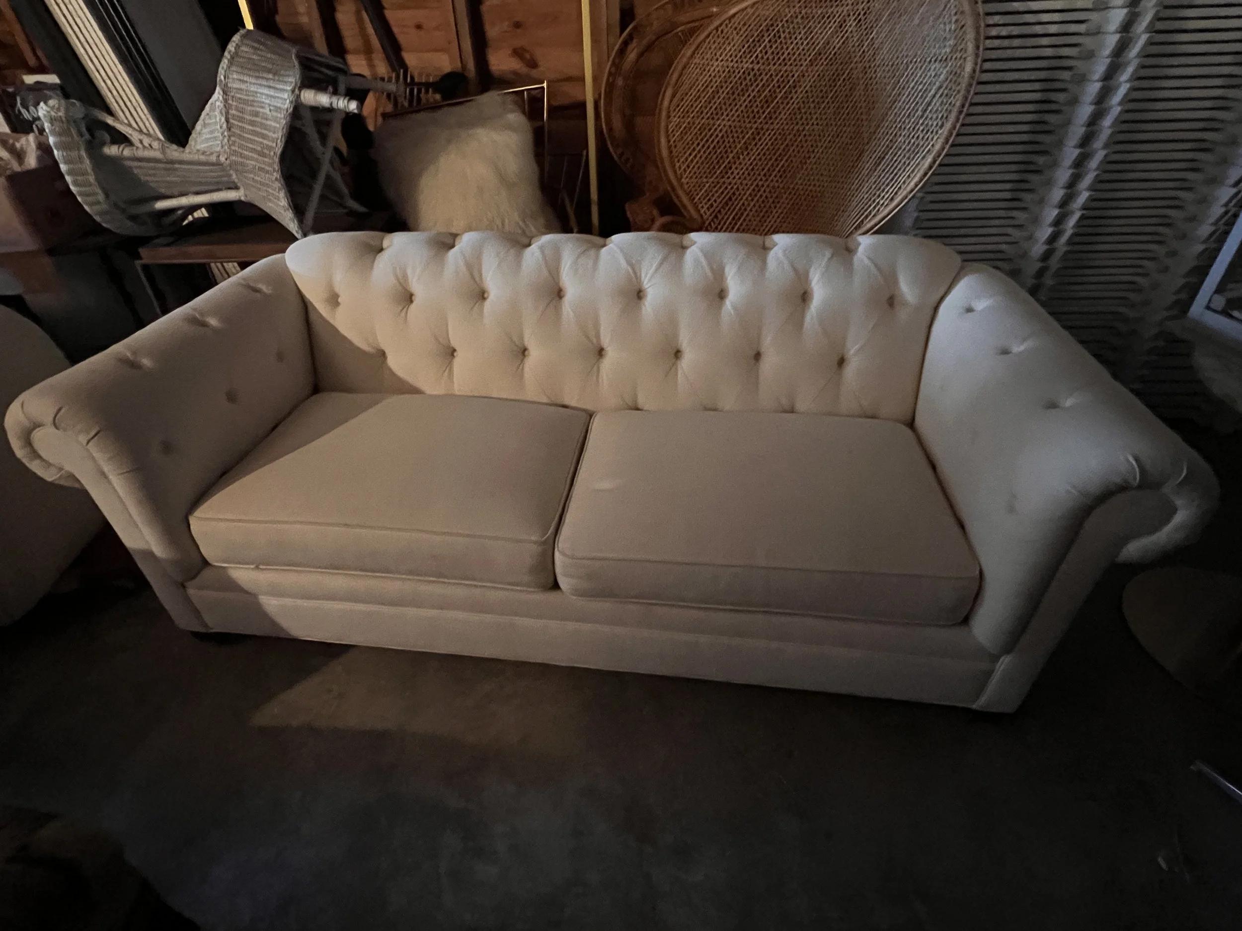 Large cream tufted couch