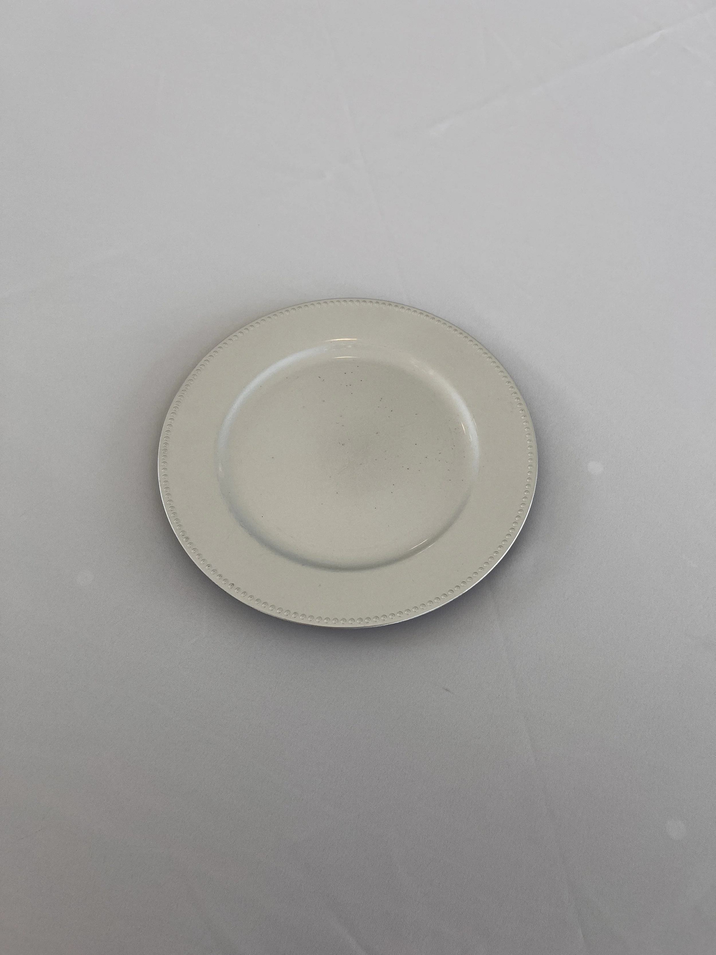 Silver charger plates for Charlotte wedding venue