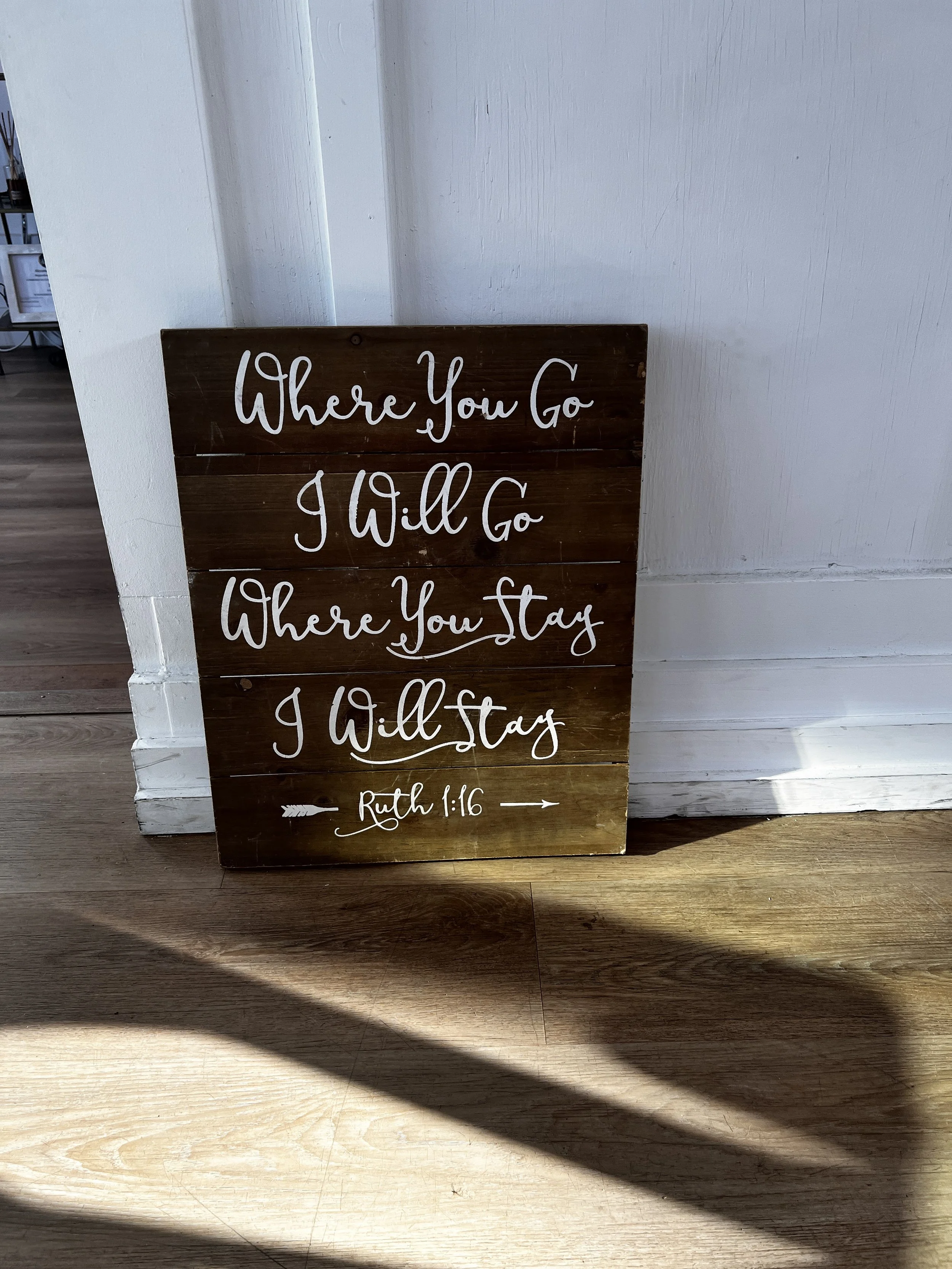 Large wooden sign "Where you go I will go where you stay I will stay" for wedding decorations at Charlotte wedding venue