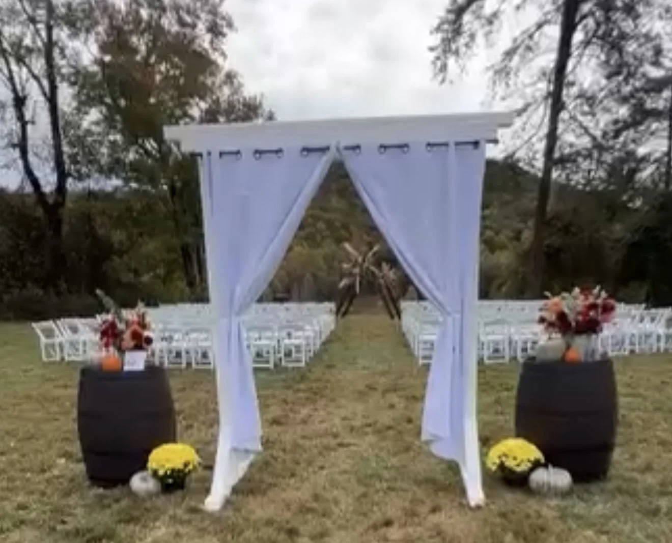 White Frame and Curtain for meadow entrance at Mountain View wedding venue near Charlotte