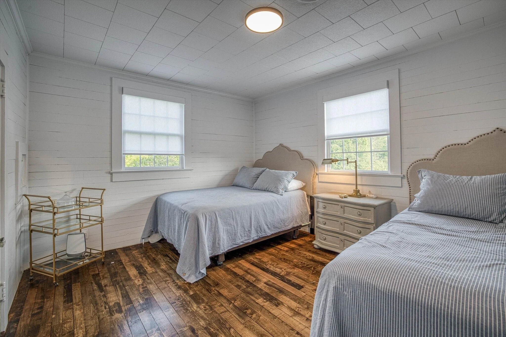 Two double beds in a rental bedroom in farmhouse
