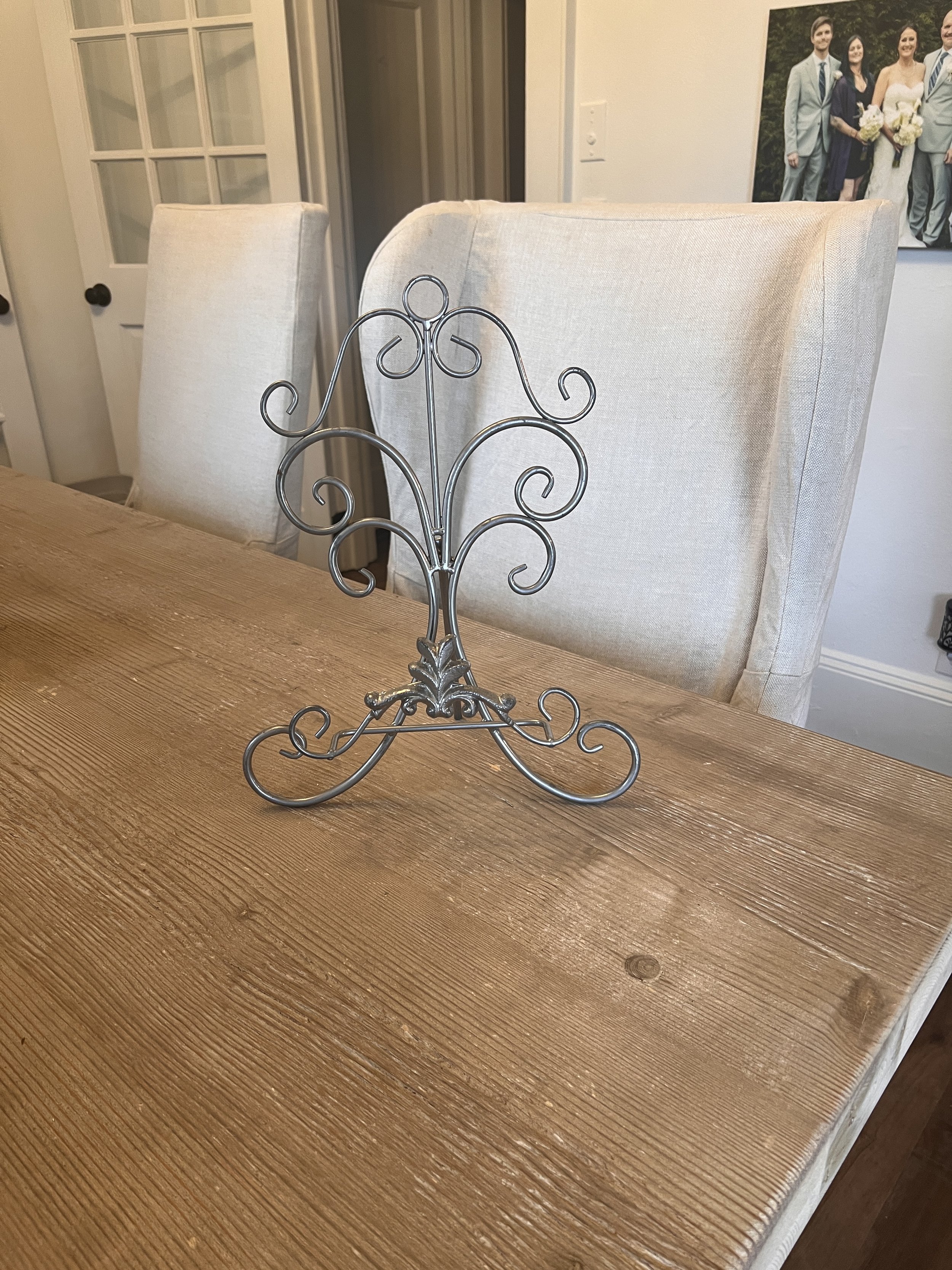 15" Tall Silver scroll easel for Charlotte wedding venue