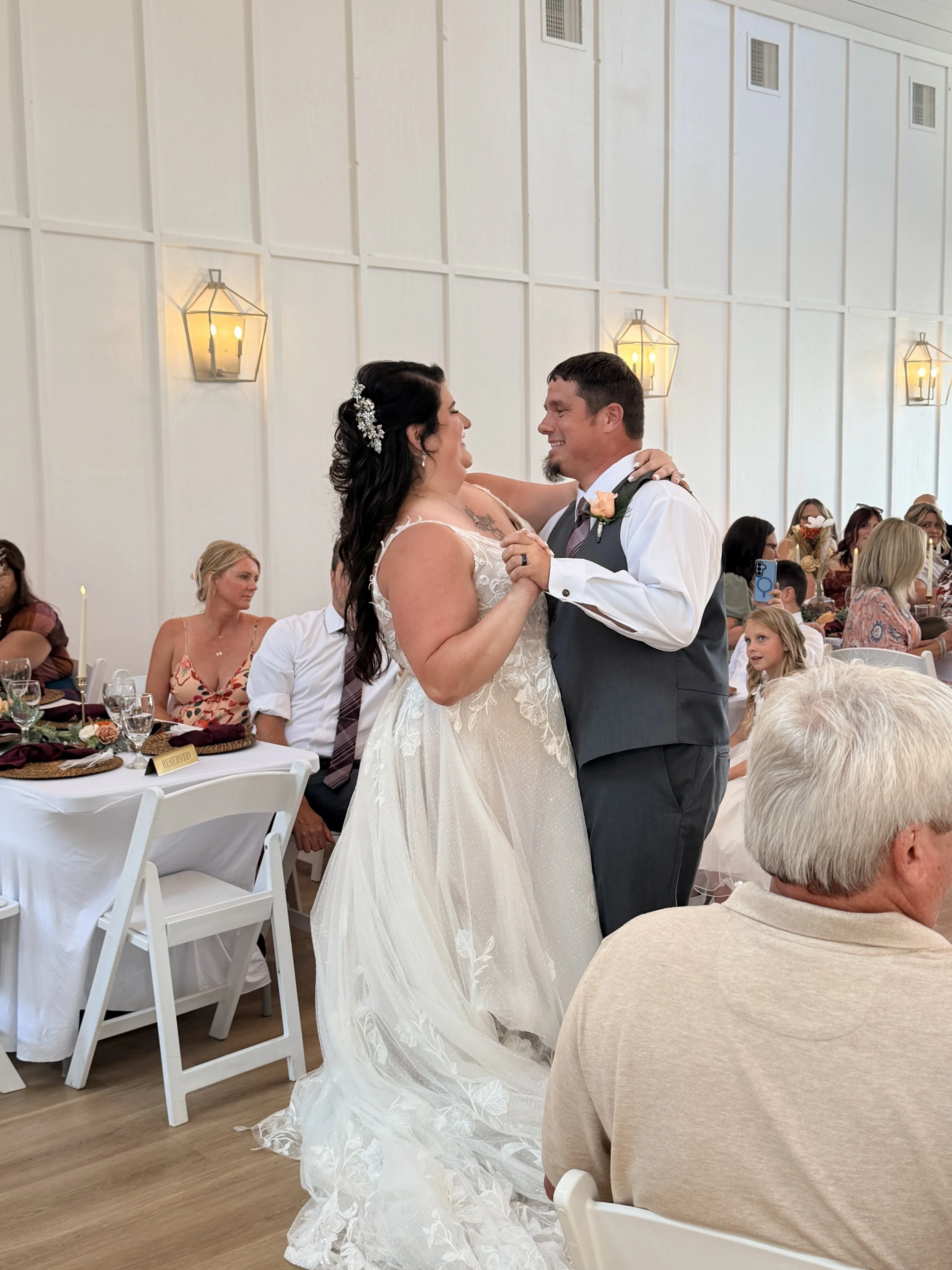Bride and groom first dance in white wedding venue near Charlotte NC; Best Wedding Reviews Near Charlotte NC