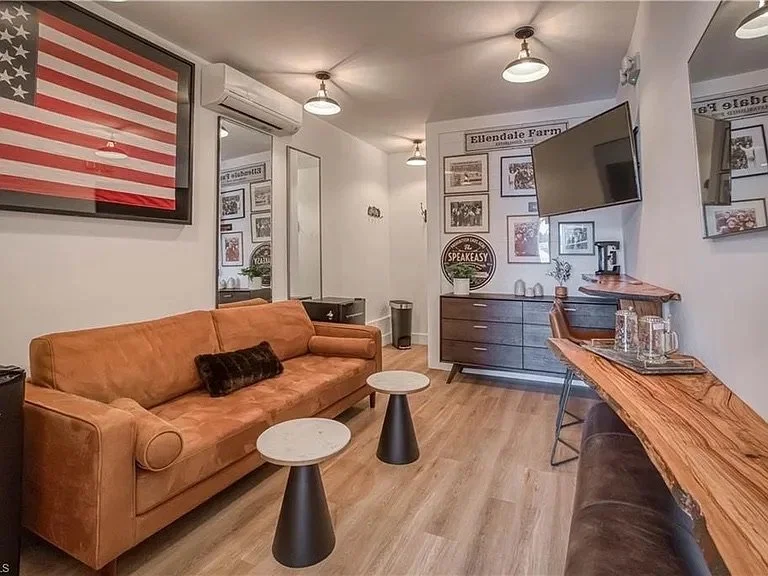 Groom suite with American flag and couch at mountain view wedding venue near Charlotte NC