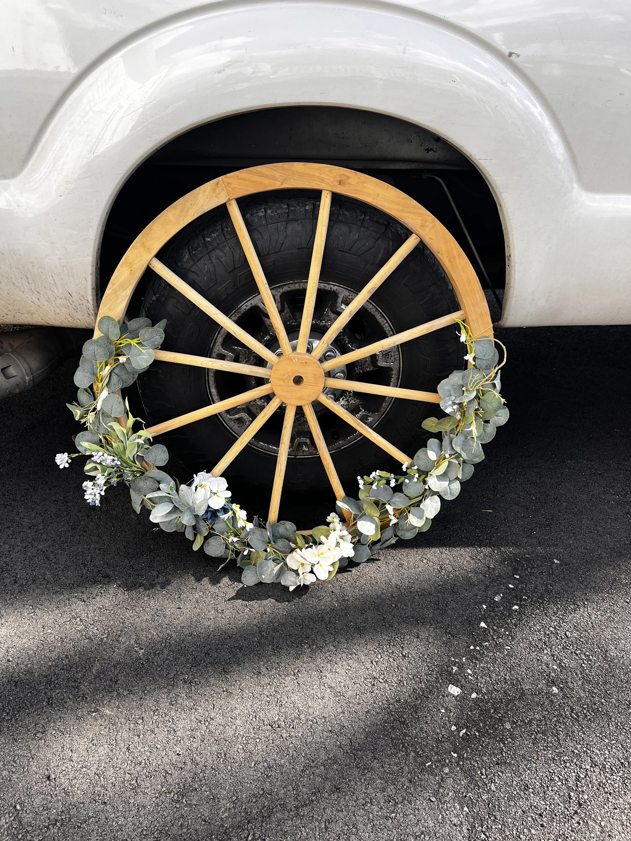 Wooden wagon wheel for Charlotte wedding venue