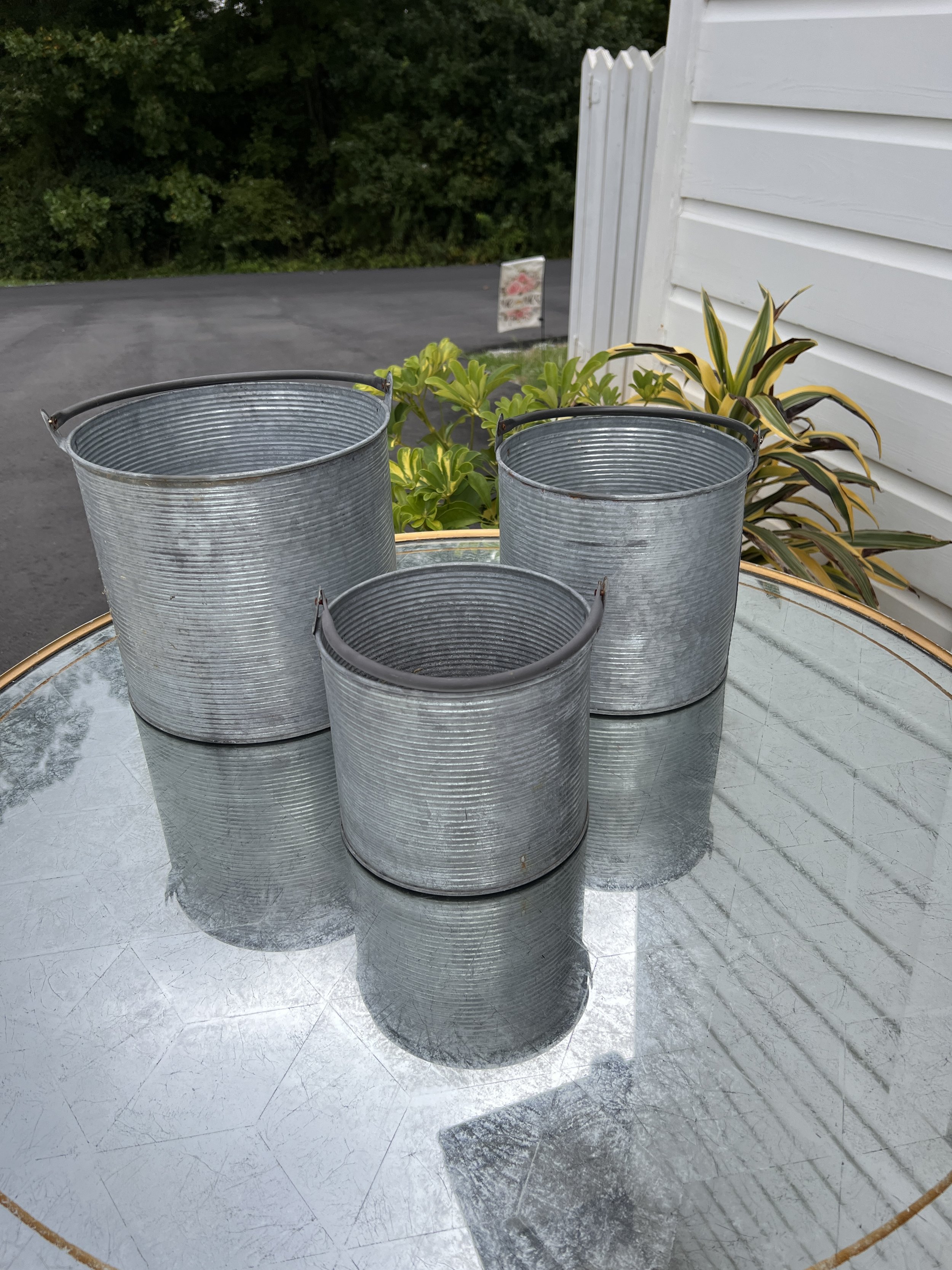 Small, medium, large tin buckets for wedding decorations