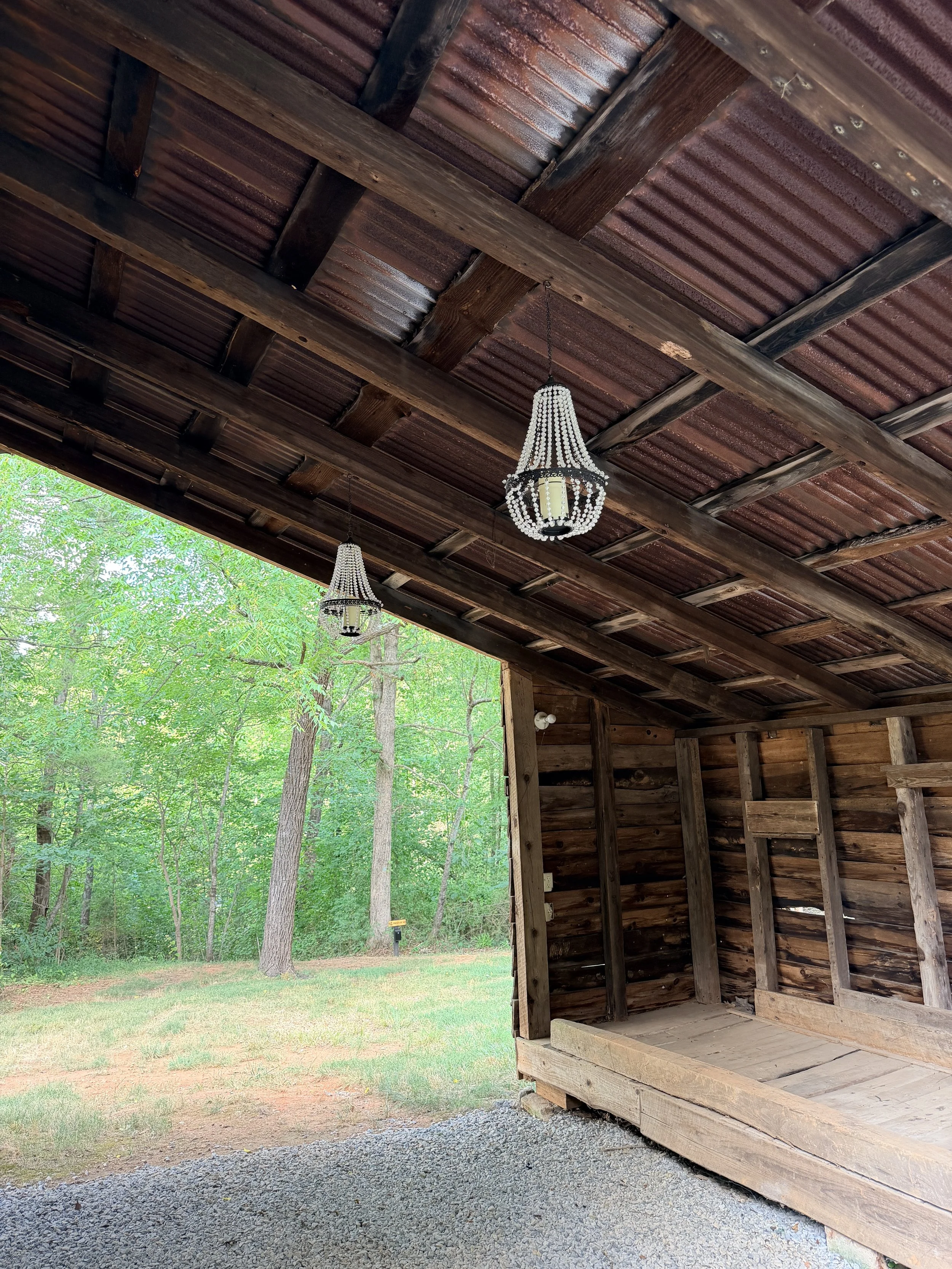 historic tobacco barn with chandeliers; best places to travel in North Carolina