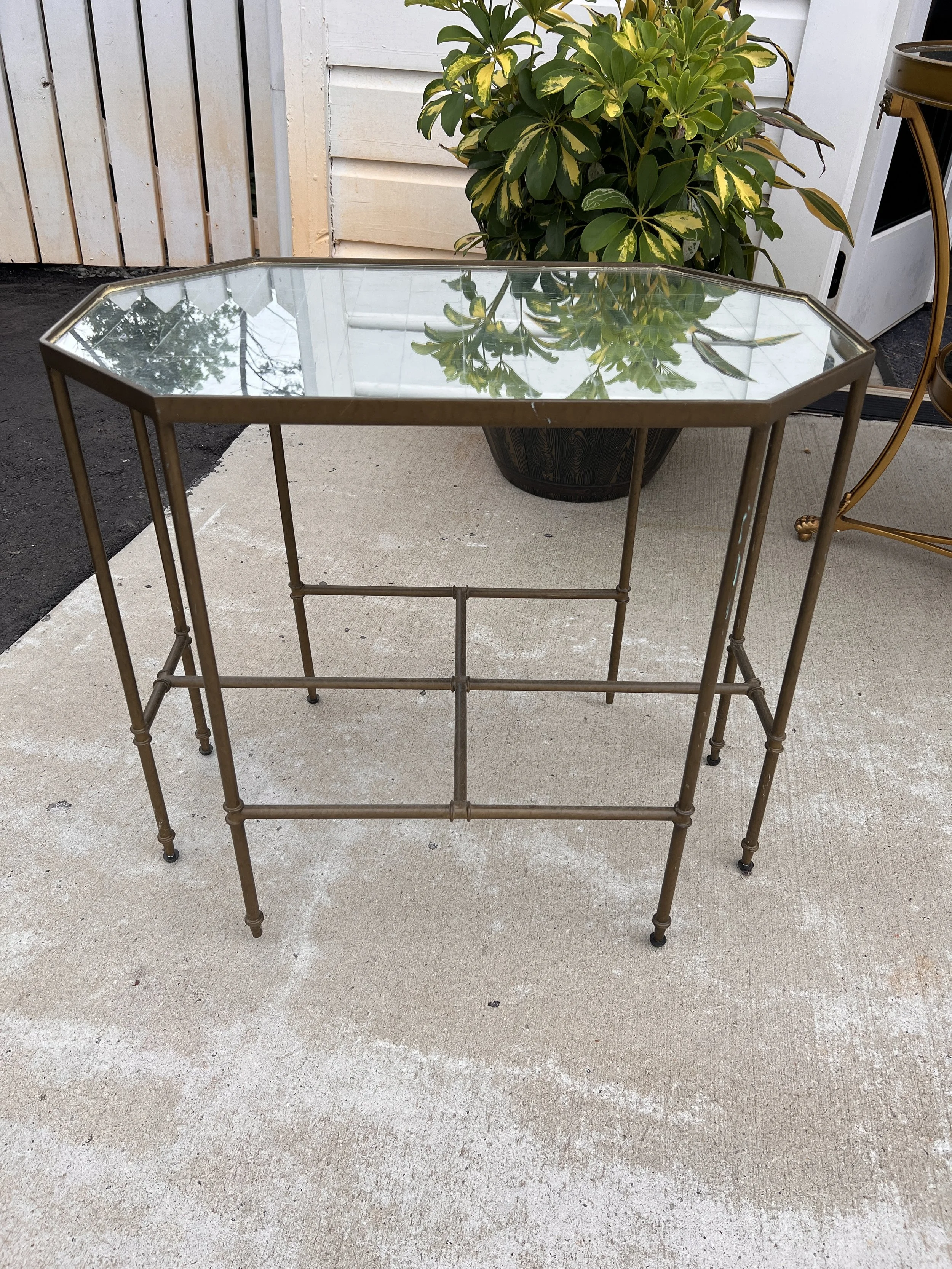 Small mirrored table with gold legs for wedding