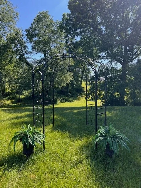 Outdoor garden ceremony at Charlotte NC wedding venue