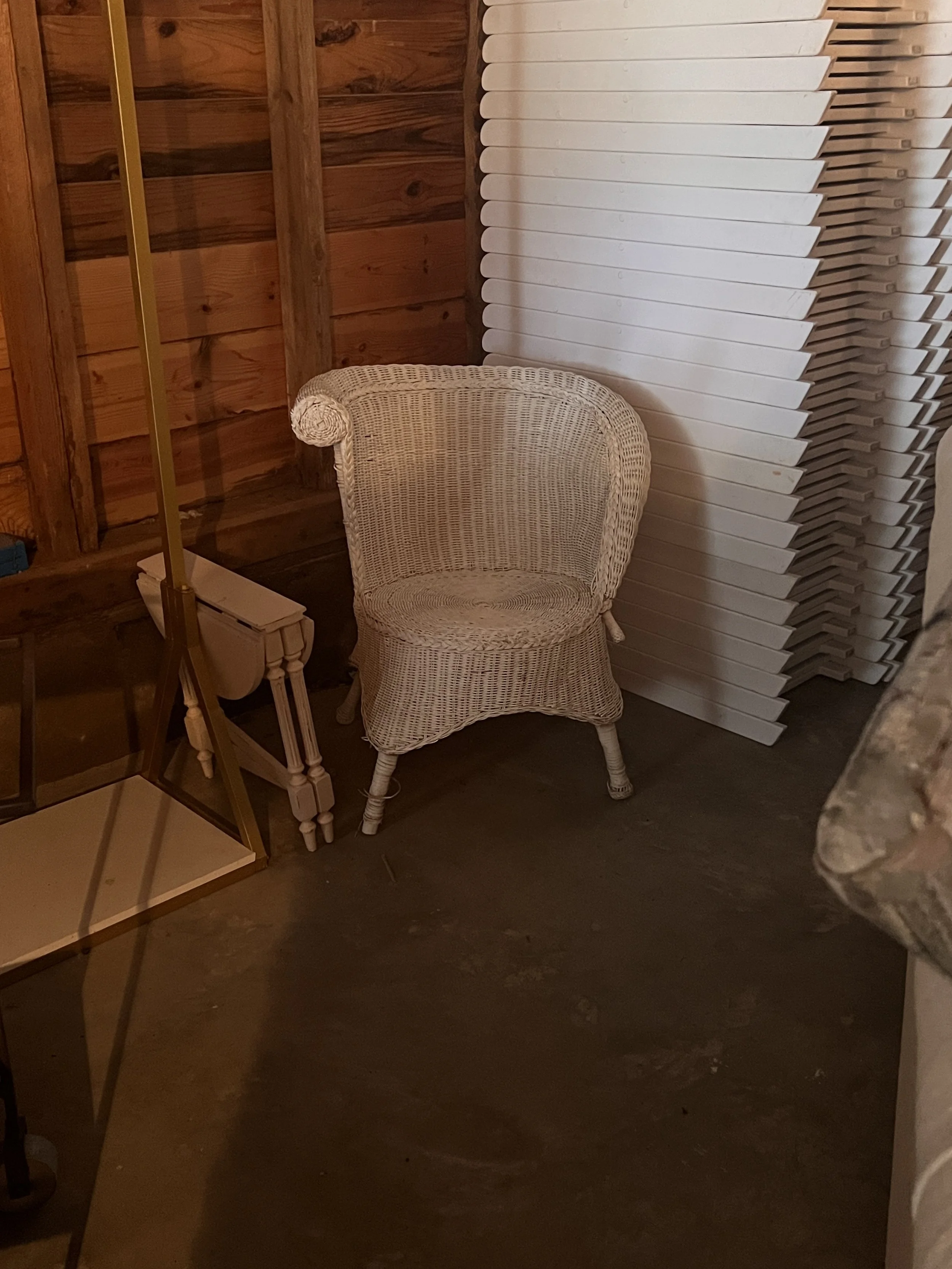 Small white whicker chair for wedding decortions