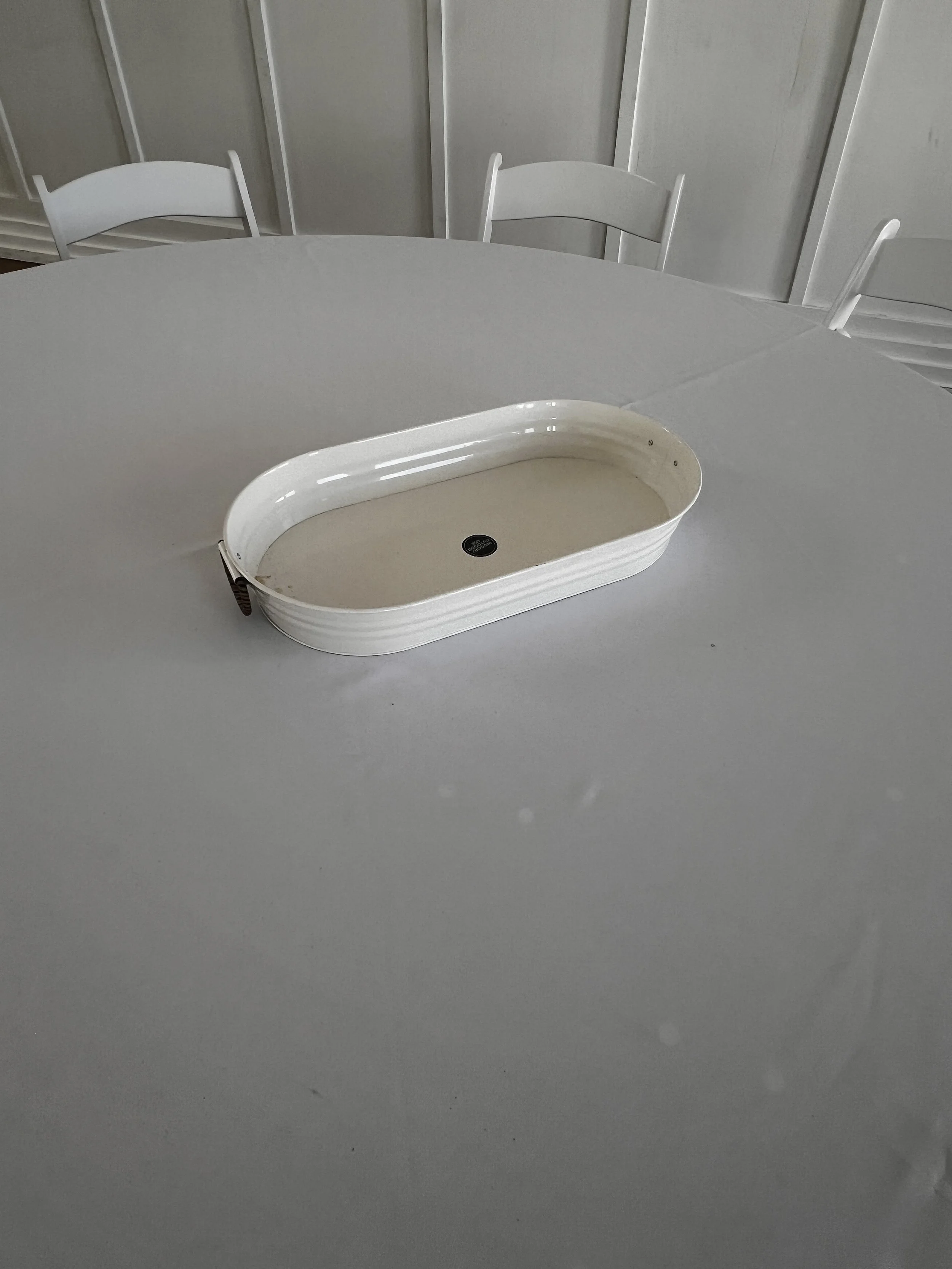 Cream oval metal tray at Charlotte wedding venue
