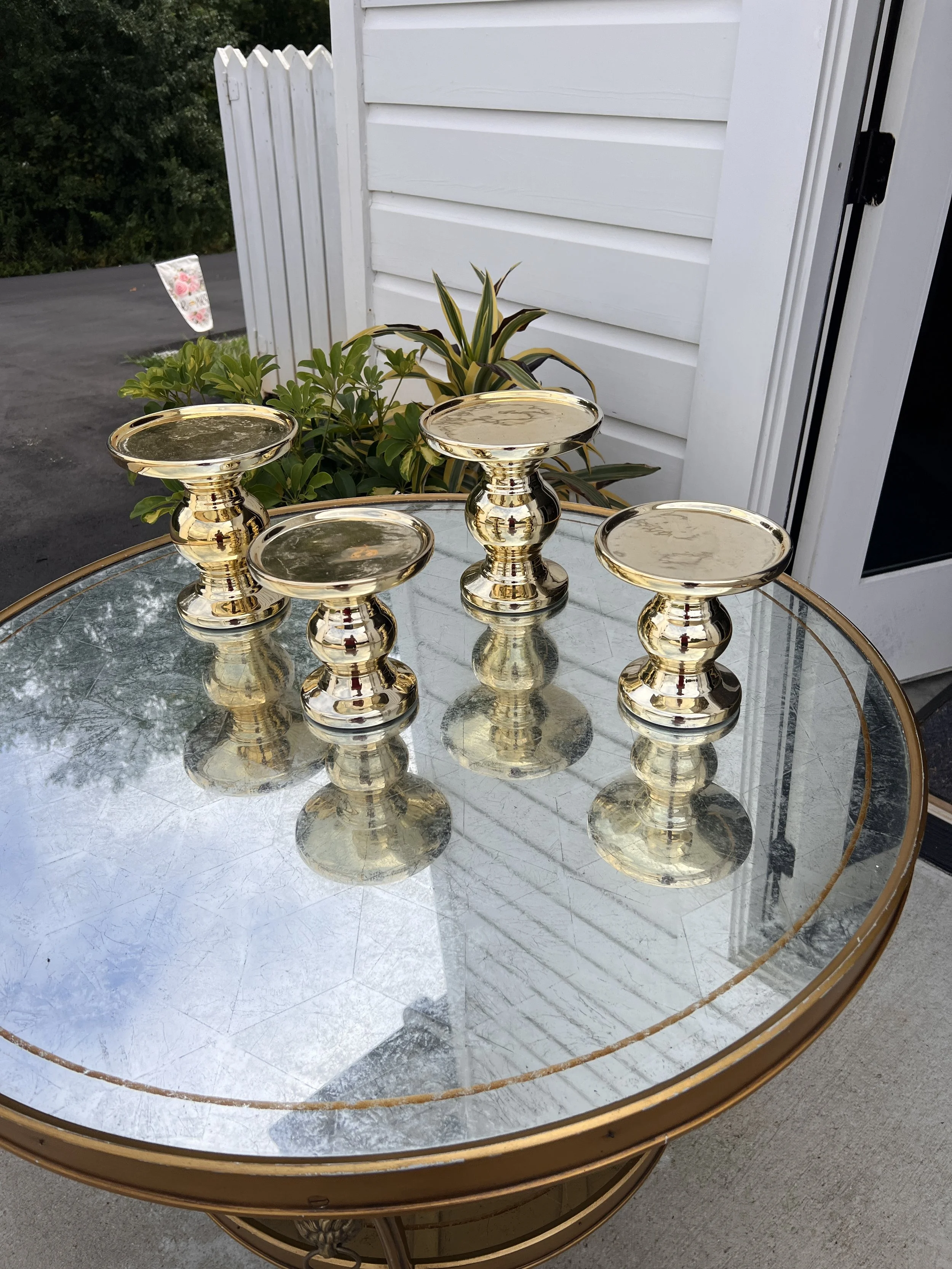 Large gold pillar candle holders and Medium gold pillar candle holders for wedding decorations