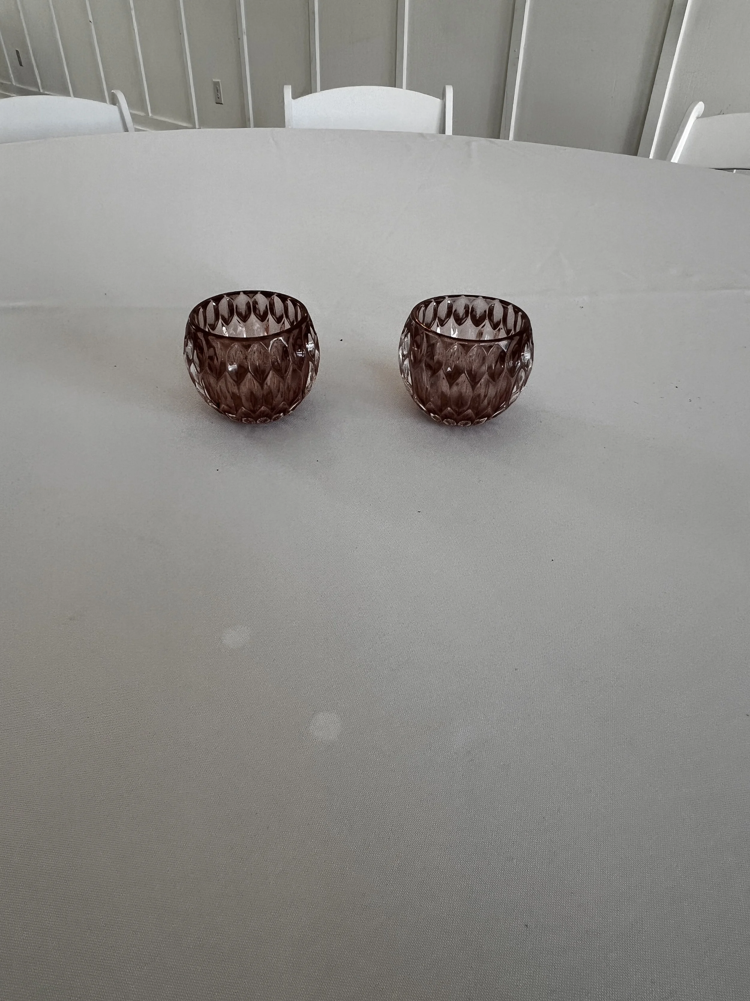 Purple votive holders at Charlotte wedding venue