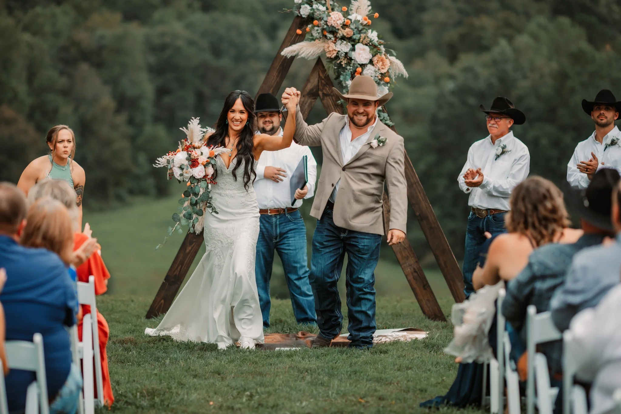 bride and groom celebrating after Mountain View ceremony at Charlotte NC wedding venue