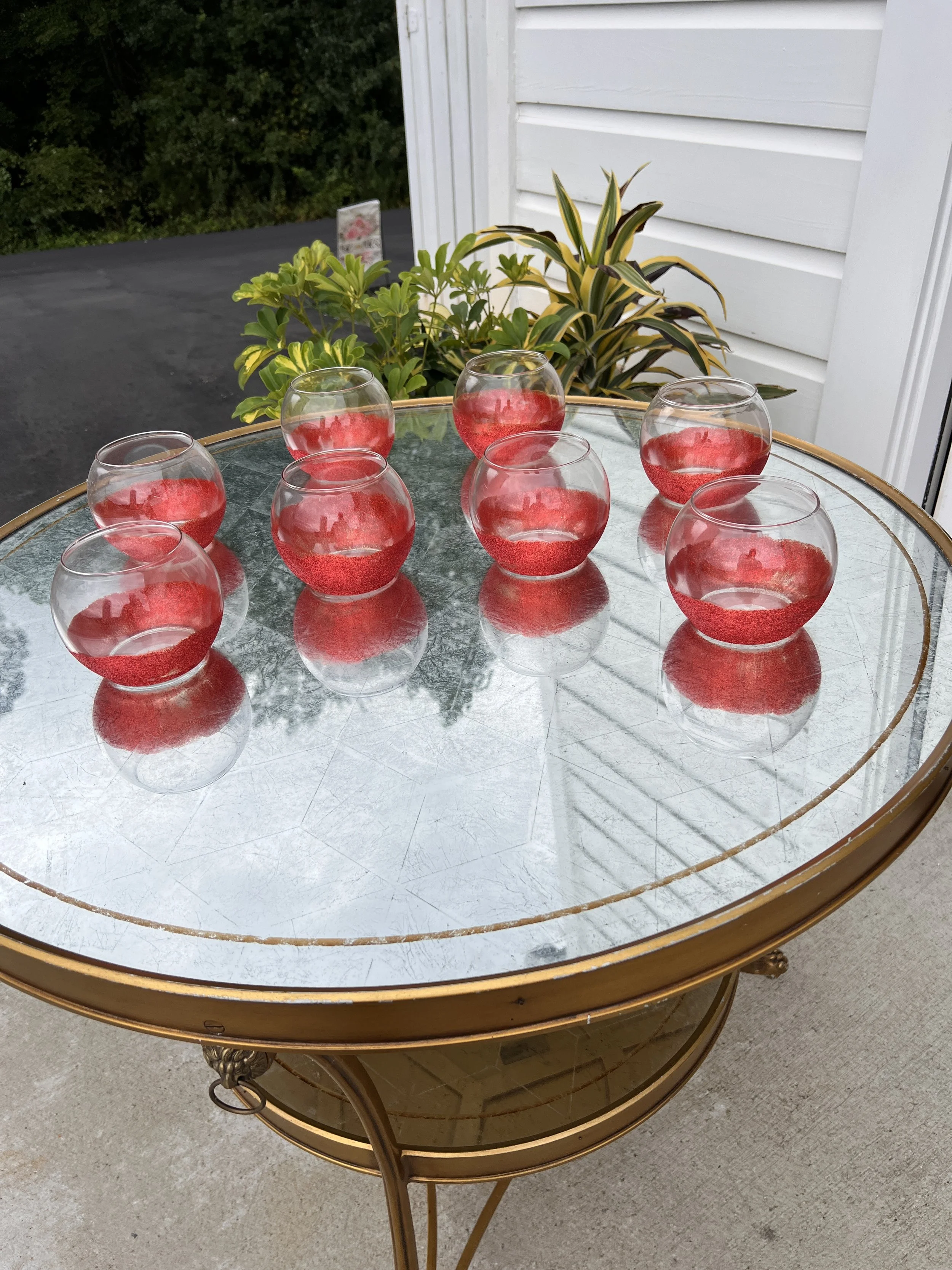Round vases with red glitter for wedding in Charlotte