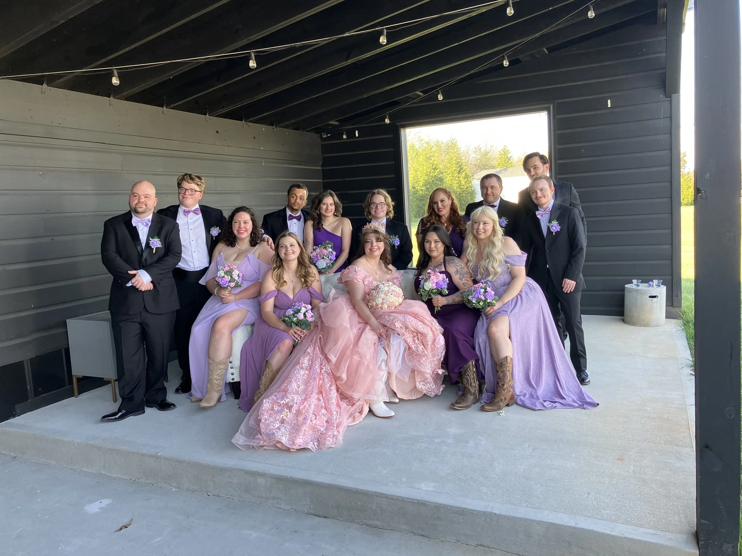 bridal party gathered in pavilion at a NC wedding venue near Charlotte; top questions to ask before booking a wedding venue near Charlotte NC