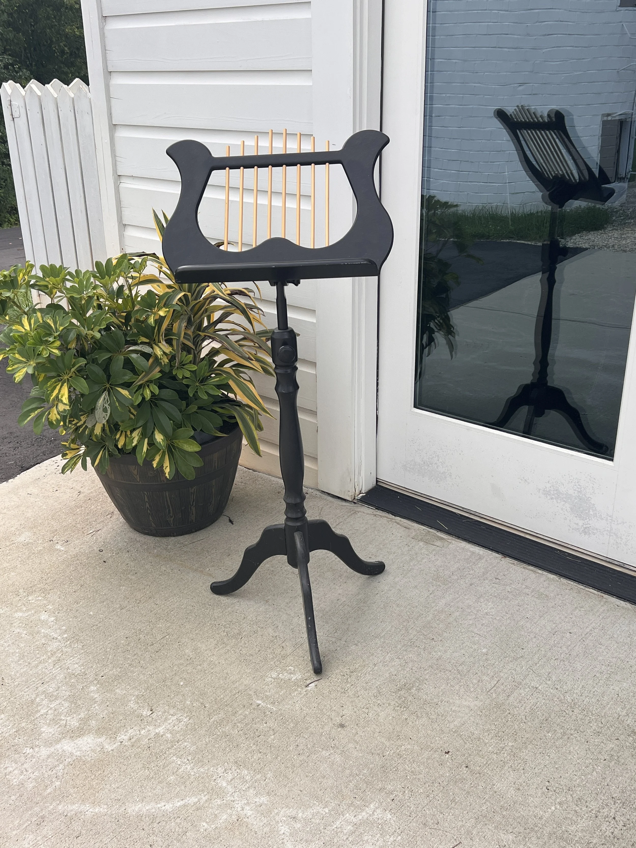 Black wood music stand for wedding