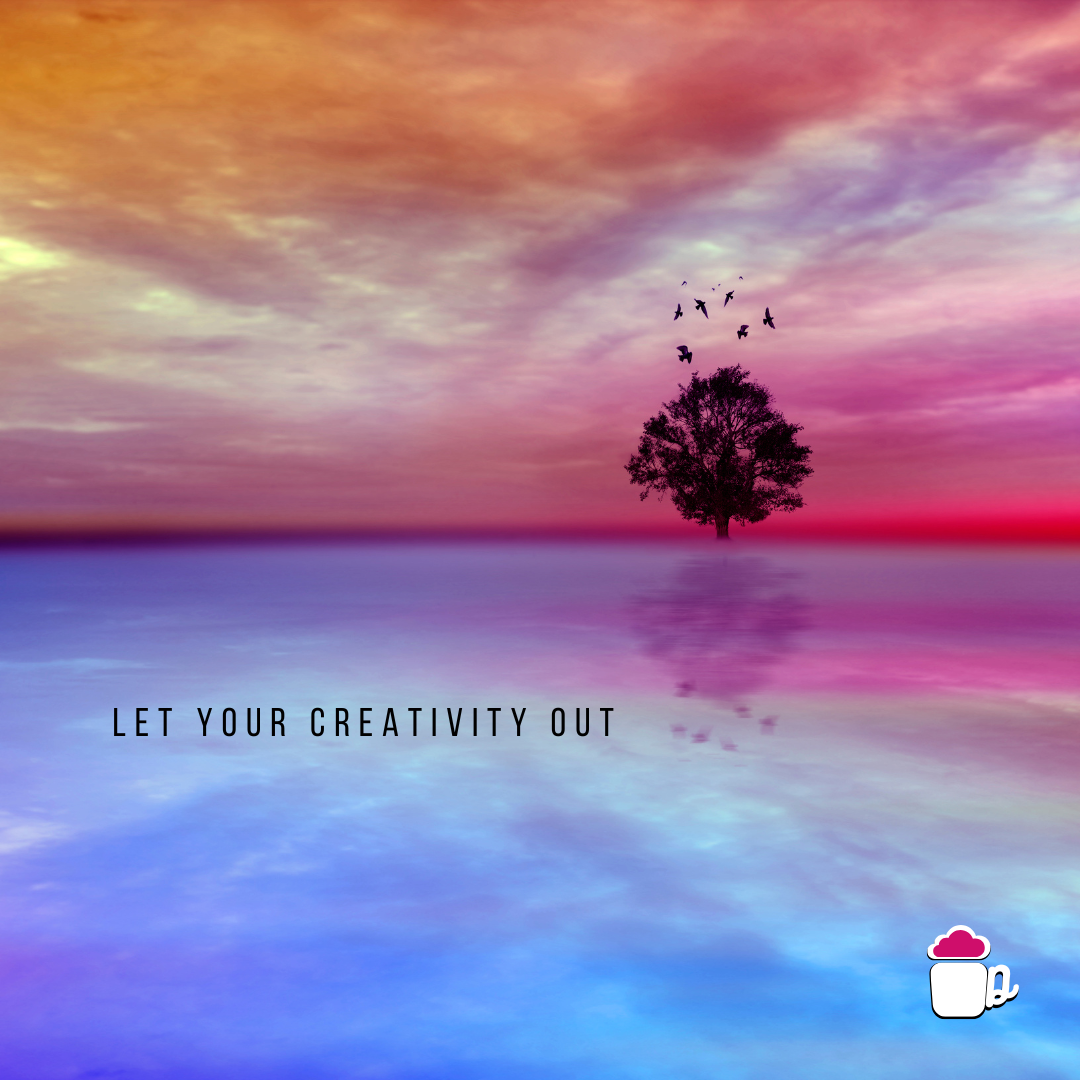 Tree on water reflecting vibrant sunset with birds and text 'Let Your Creativity Out'