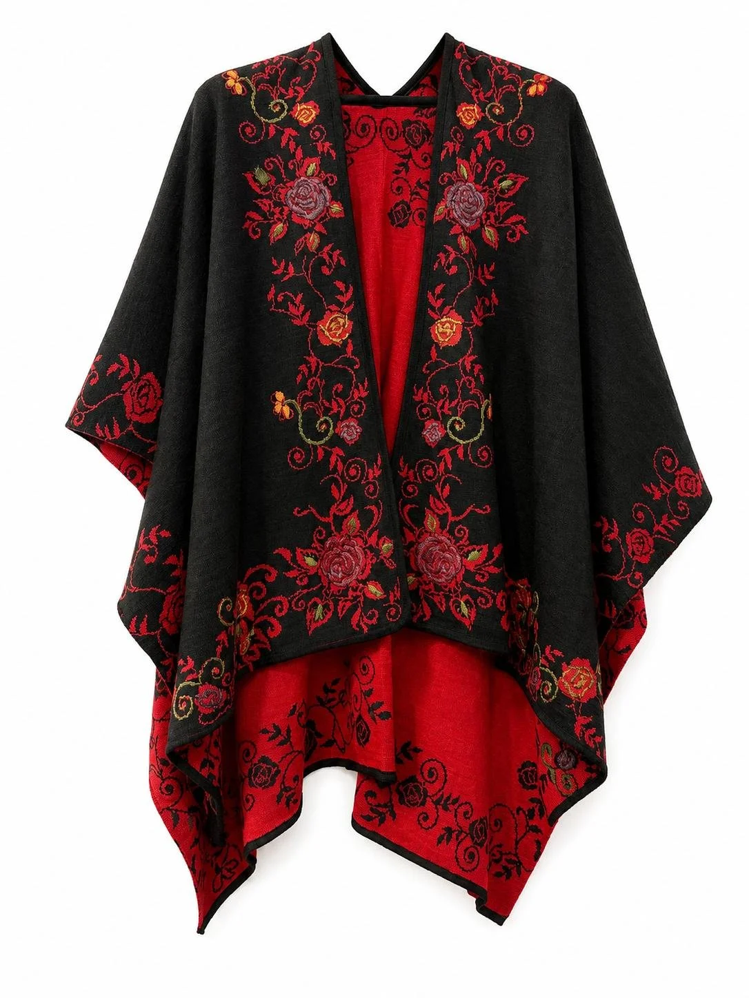 Elena reversible alpaca ruana reversed to black and red with hand-embroidered floral patterns..jpg