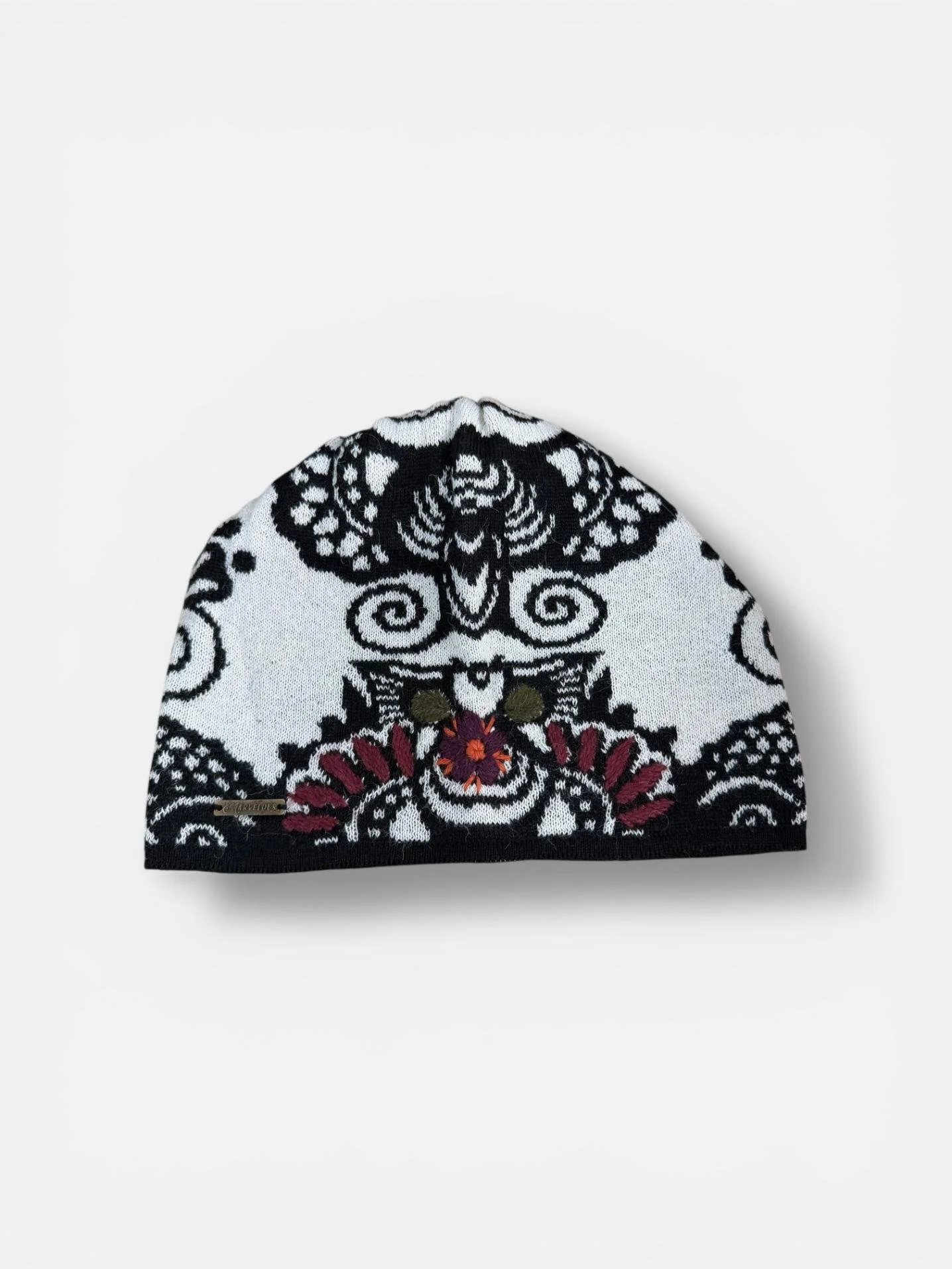 White hand embroidered beanie same luxury.jpg