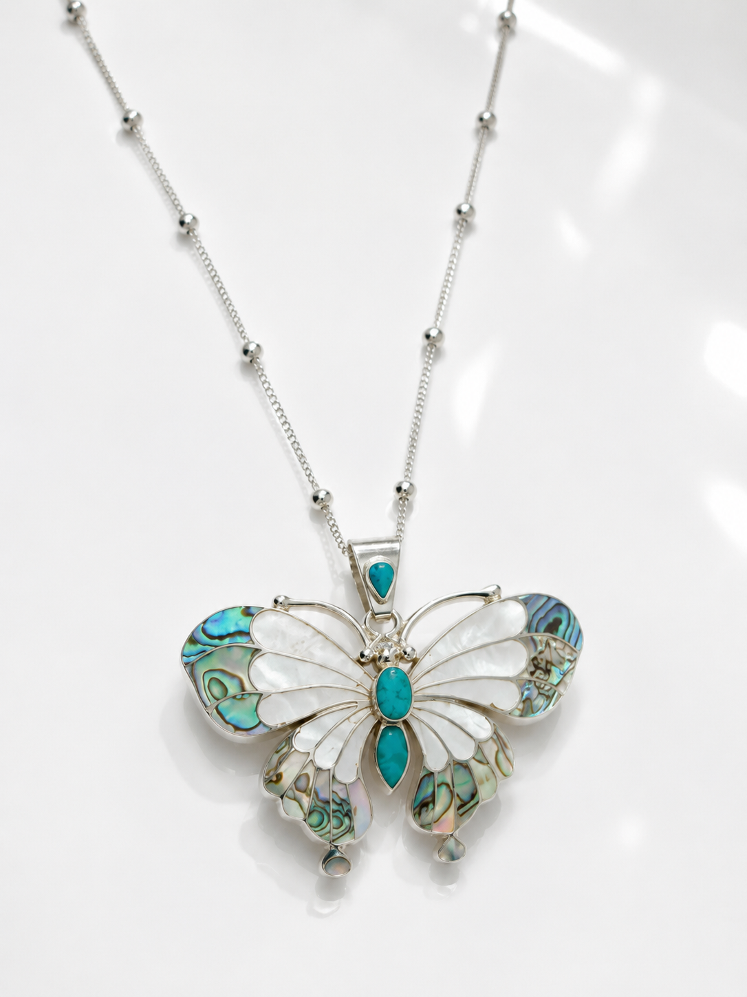 sterling silver butterfly turquiose handmade.PNG