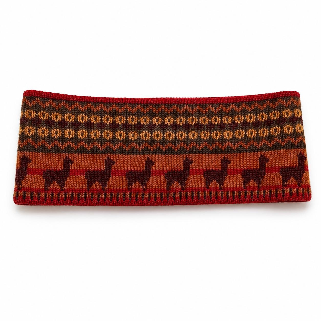 Ayni alpaca headband in Rust Red with burnt orange, deep burgundy and warm brown geometric knit pattern featuring repeating llama motifs.jpg
