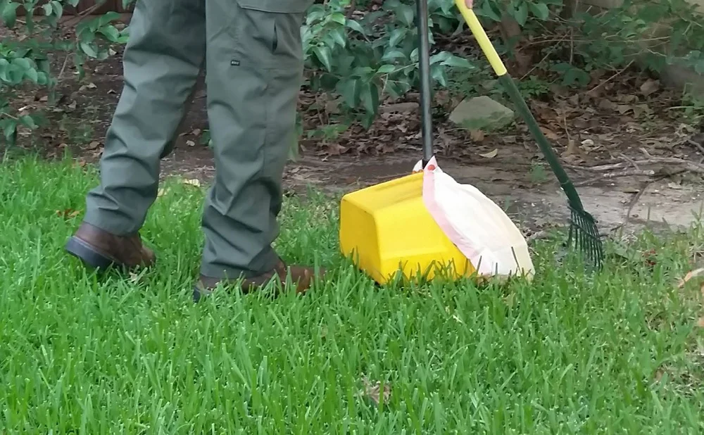 Scoop Dog equipment and scooping tools set up on a commercial property lawn in Ottawa