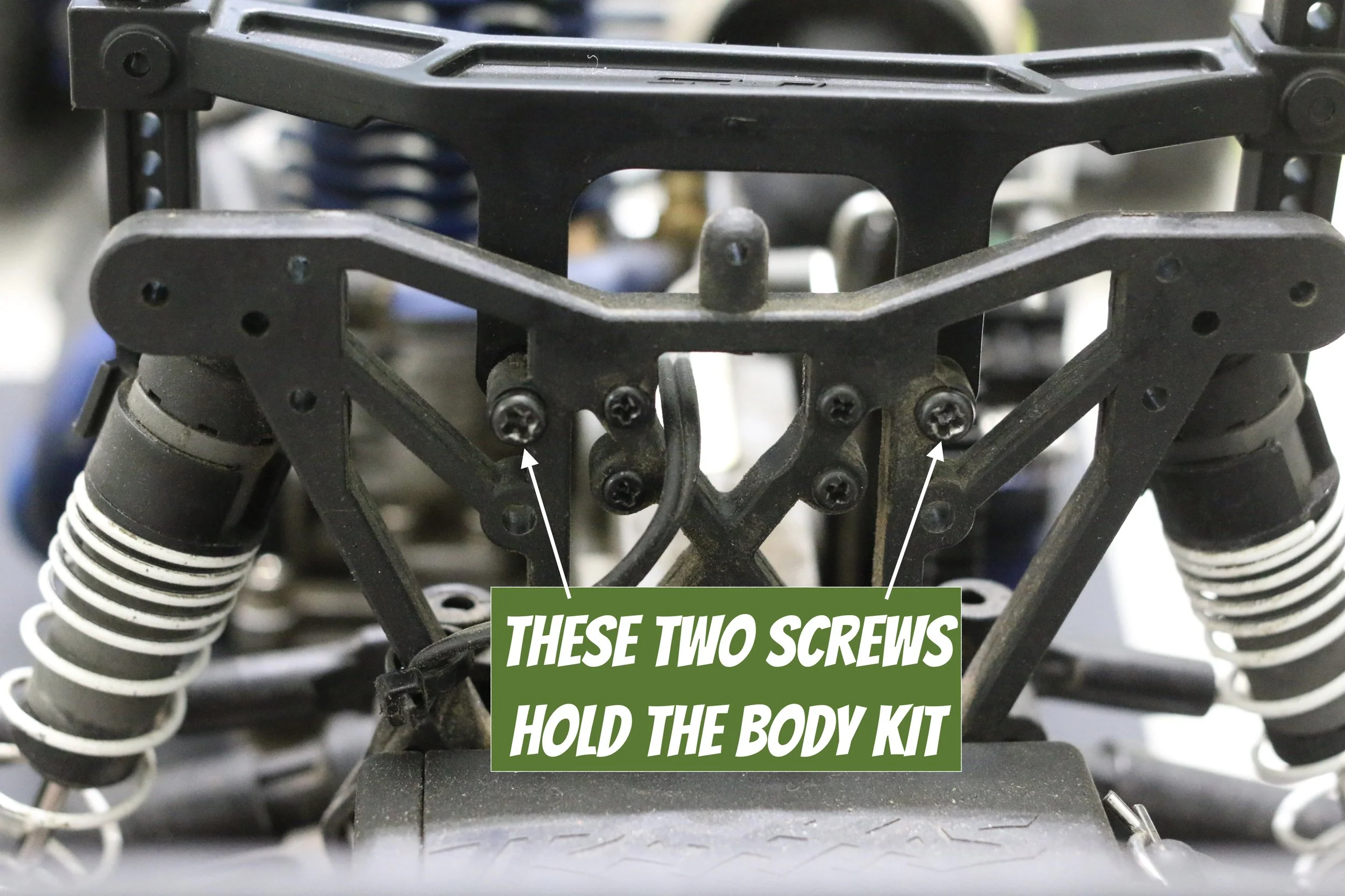 These are the two screws you use to flip around the body mount in the rear.