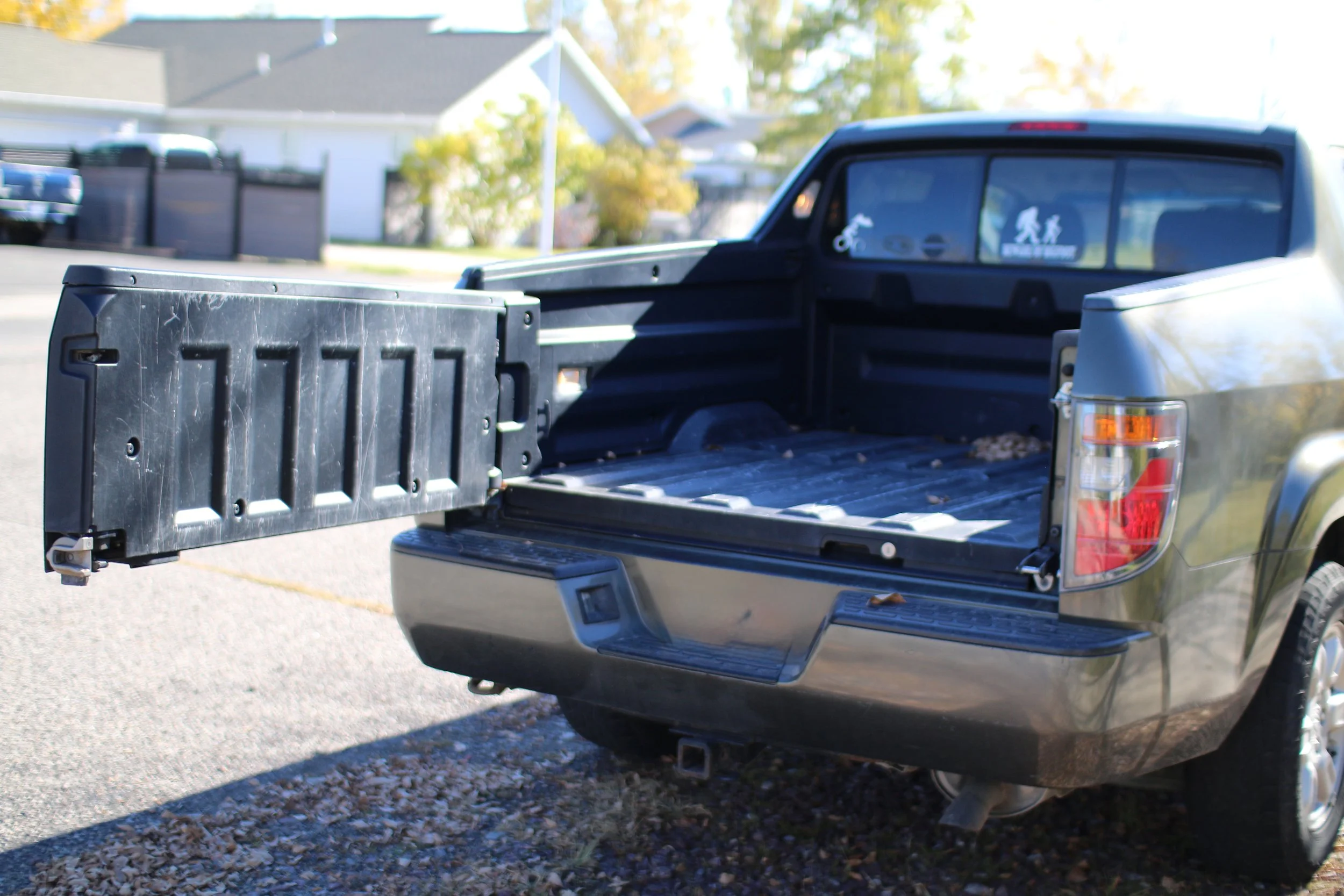 2006 honda ridgeline tailgate.  This is opened to the side so you can step upon the bumper.