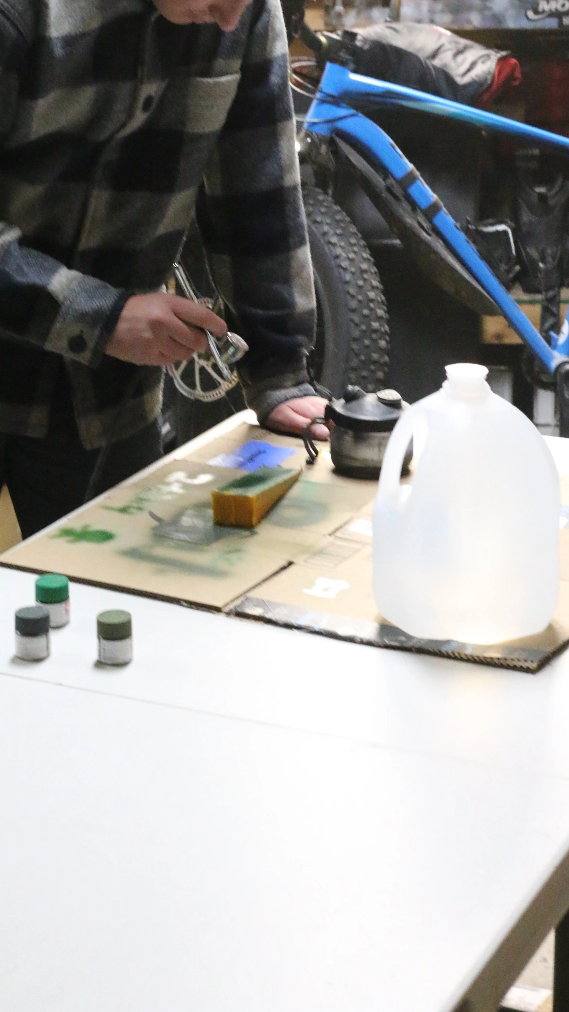  Here my son is airbrushing the car.  We used Tamiya Army Green Paint 