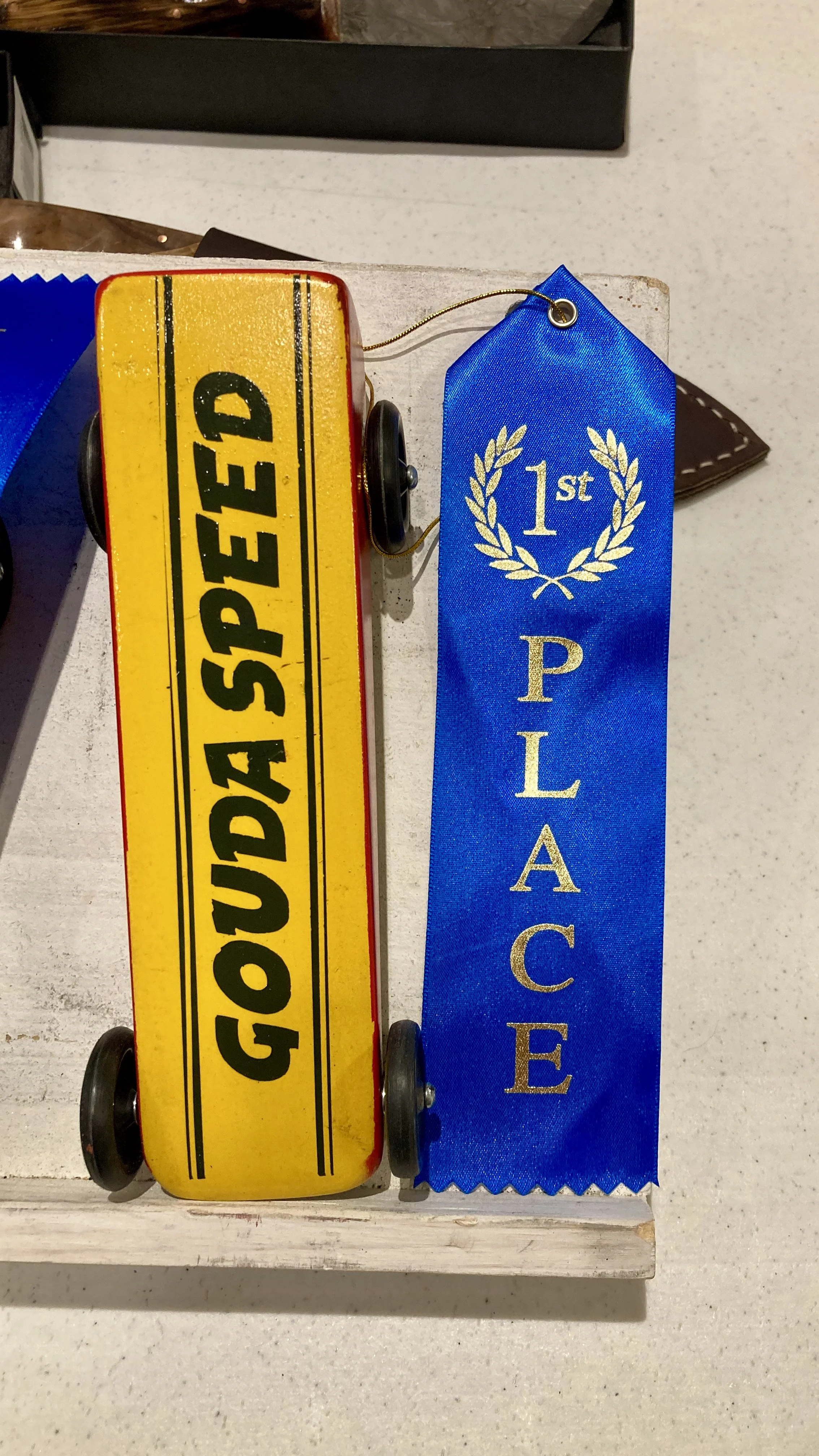  Here is the ribbon that he won at the beauty contest. 