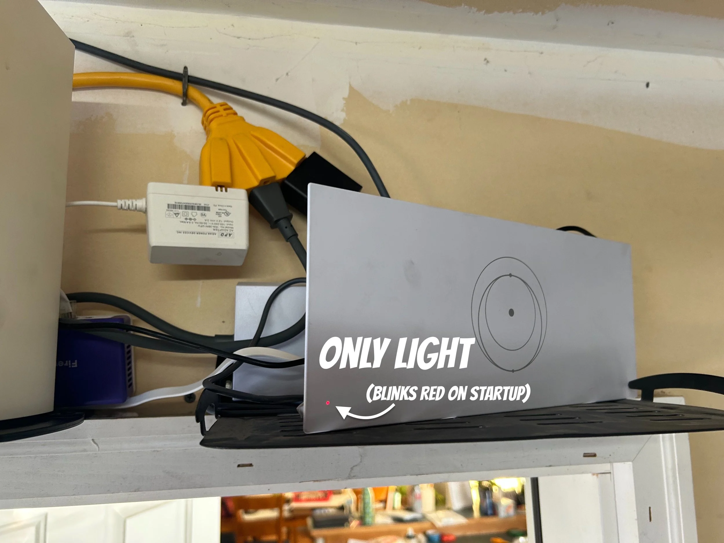 this is the starlink modem that comes to life when you connect.  There is one light on the corner.