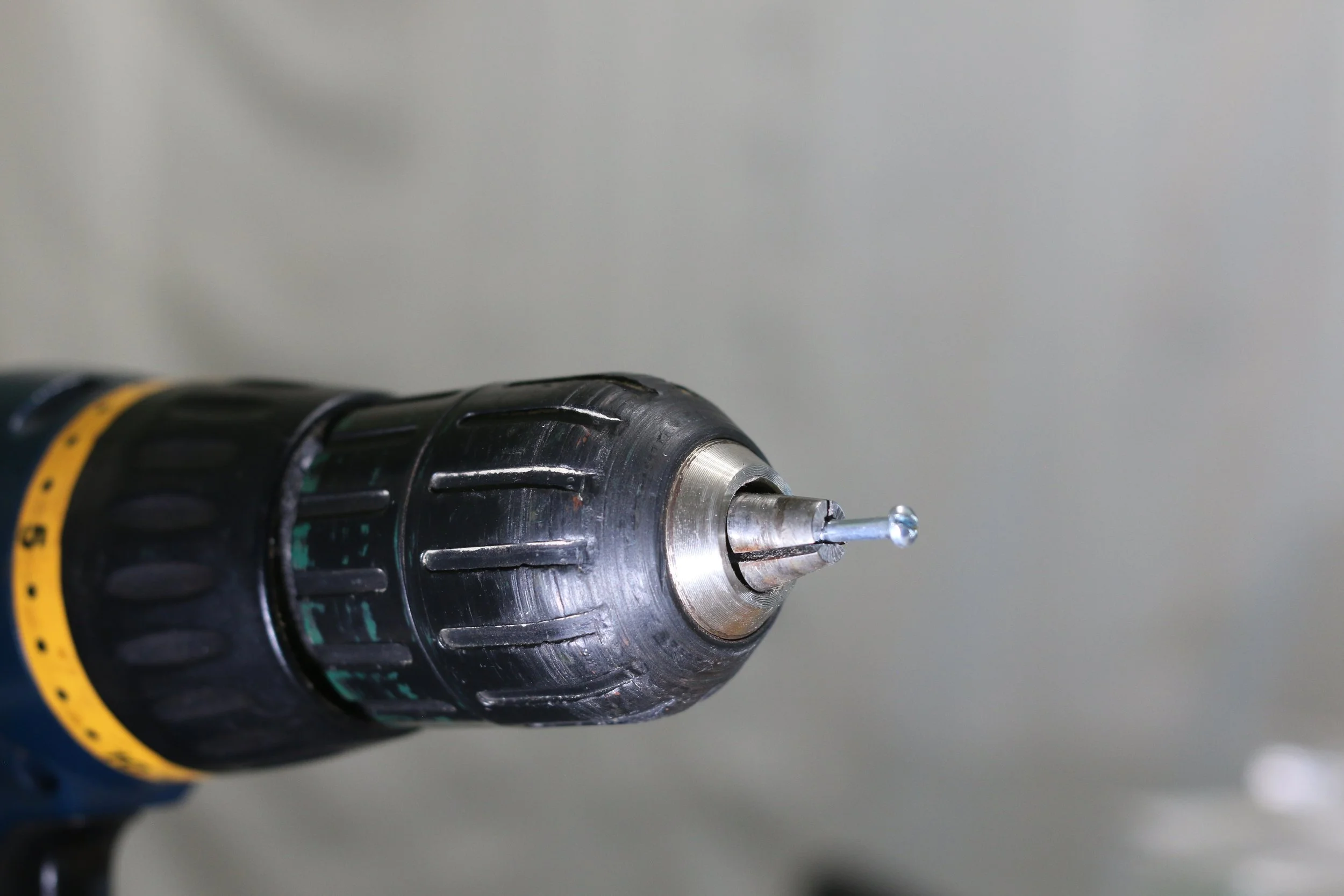 This is the axle for a pinewood derby car.  It is set to sand/steel wool the axle smooth.