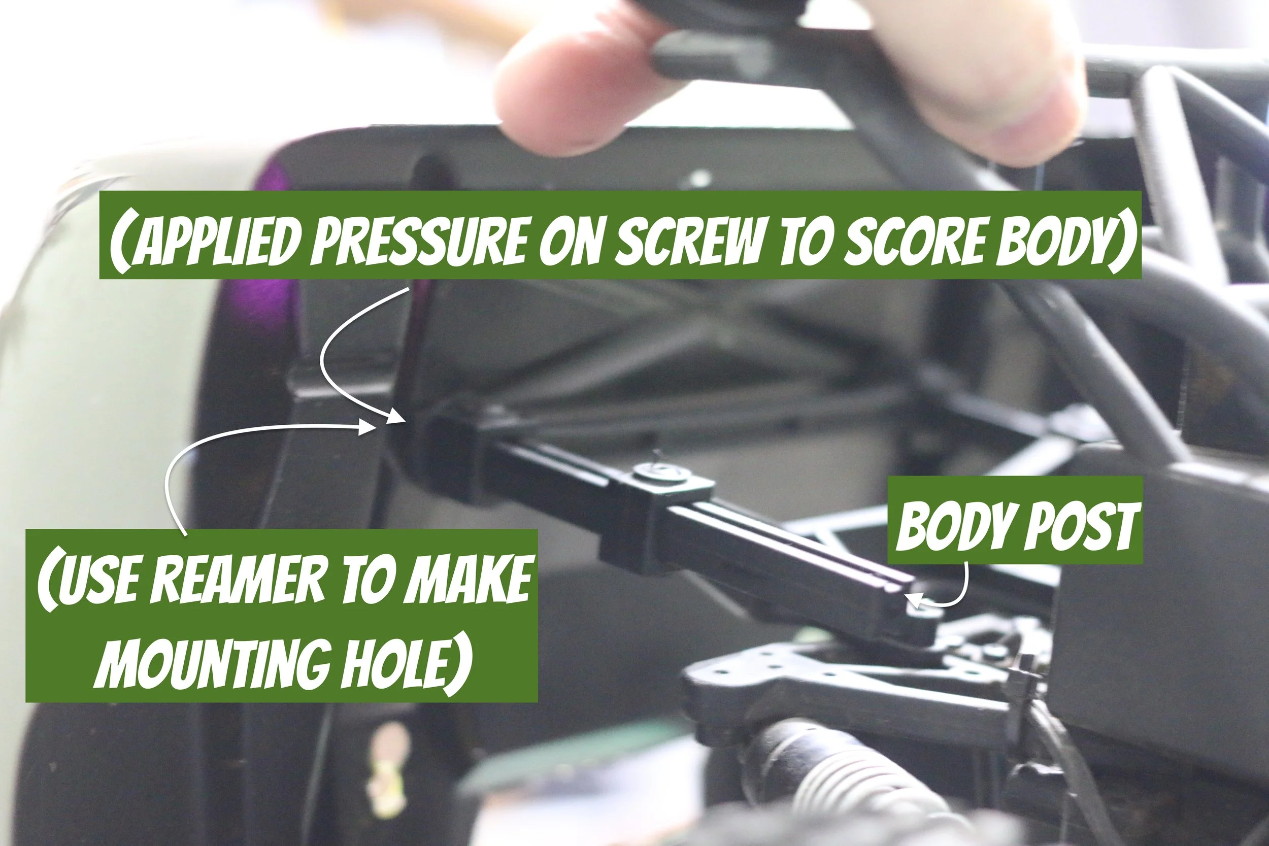 This is how I made new holes in the body so the proline body mount kit for slash would fit properly
