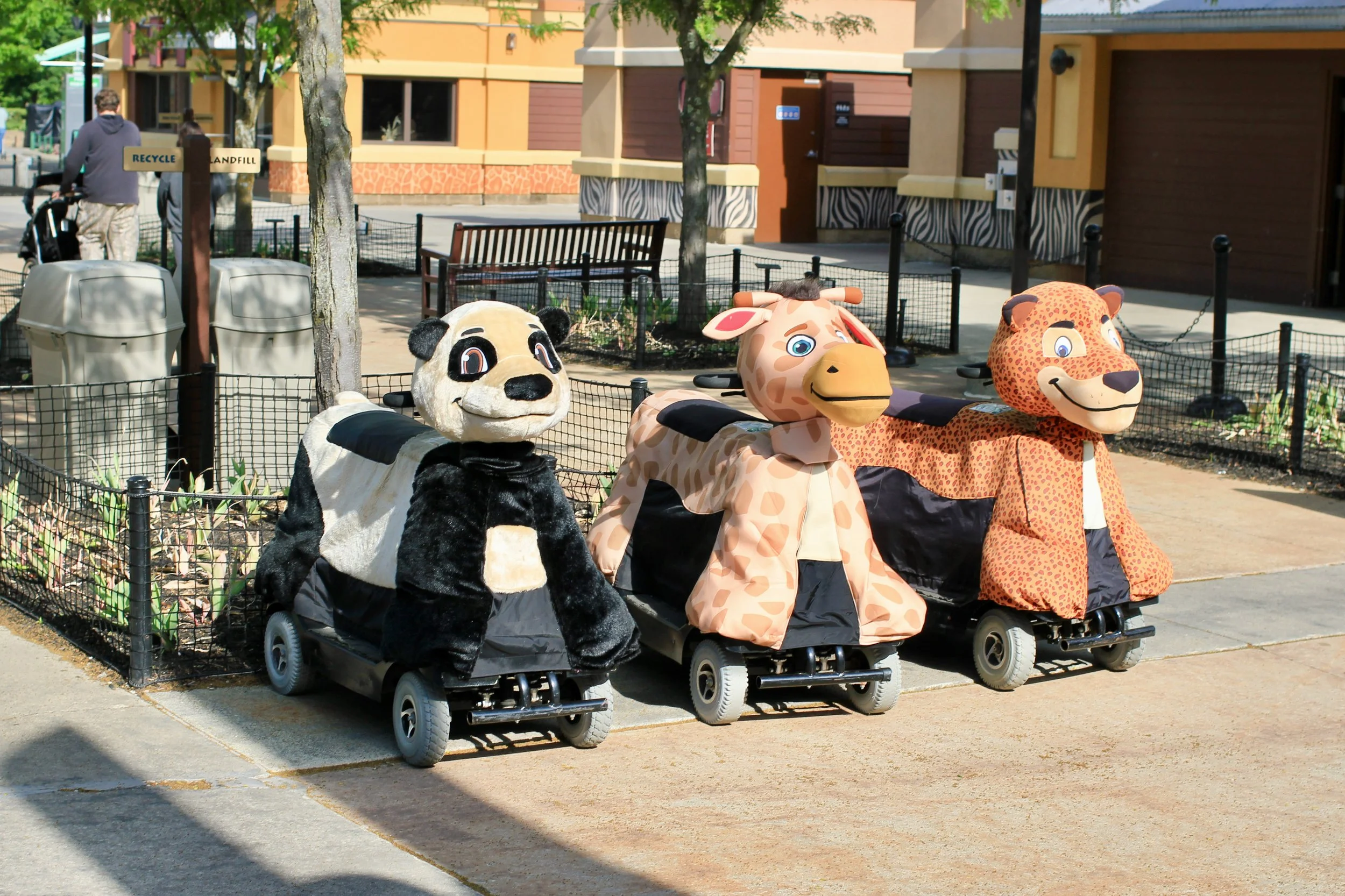 motorized scooter covered in an animal cover to tour the columbus zoo
