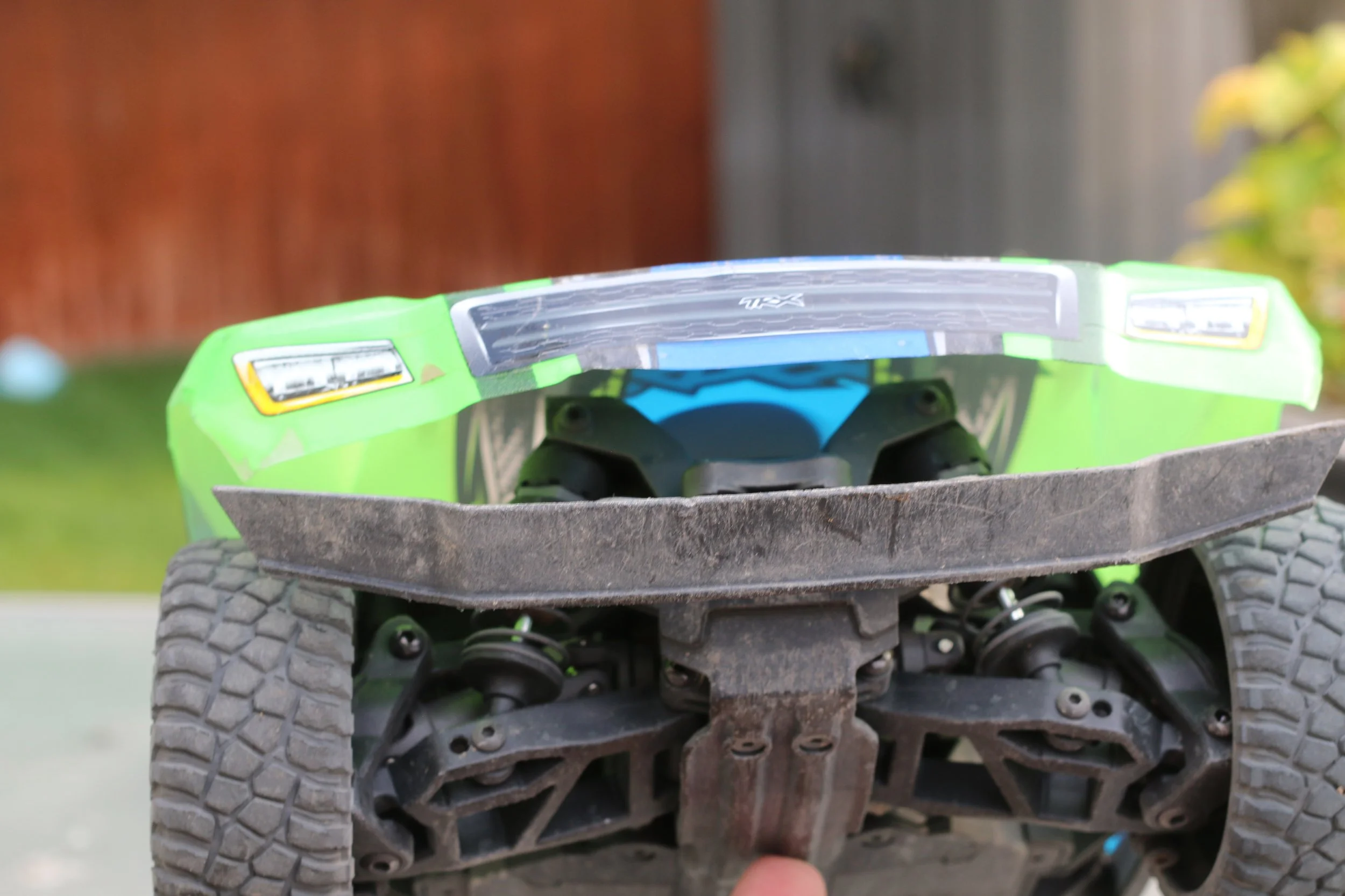 This is a bent bumper on a Traxxas Slash Mini.  It is made from rubber and bubble gum.