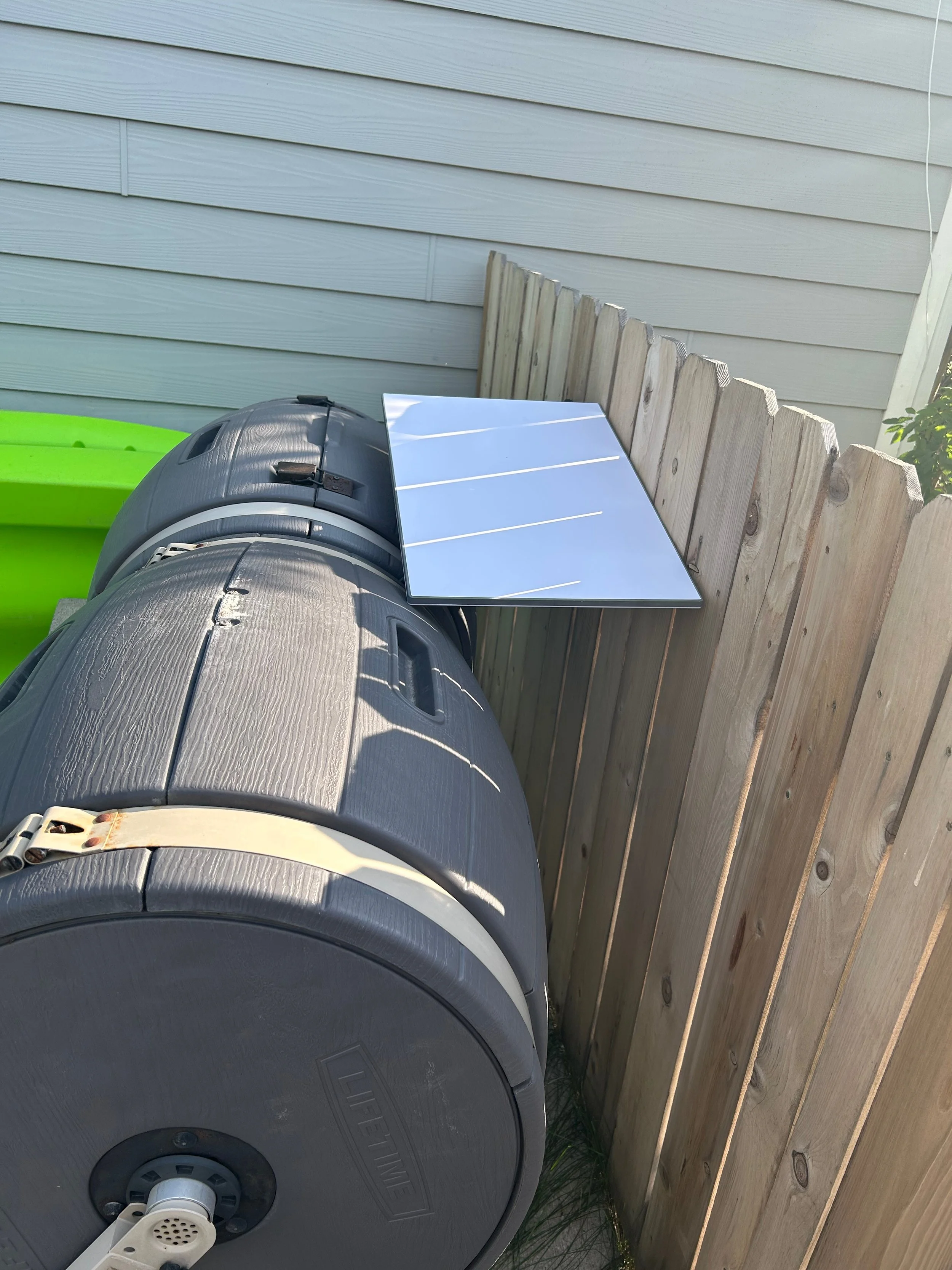 Starlink antenna laying down on the ground