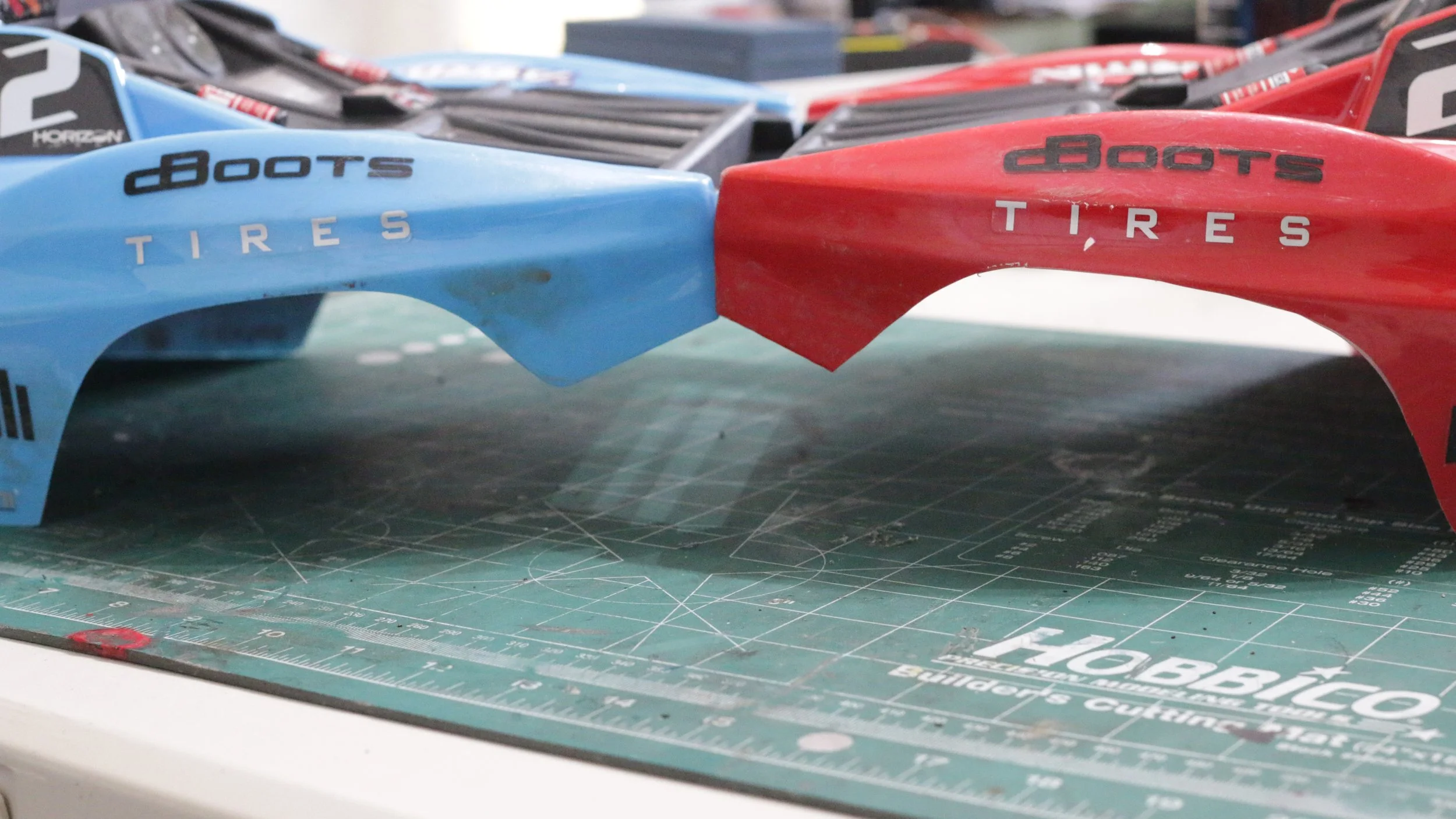 Stock vs trimmed Arrma Fury body comparison showing minimal visual difference