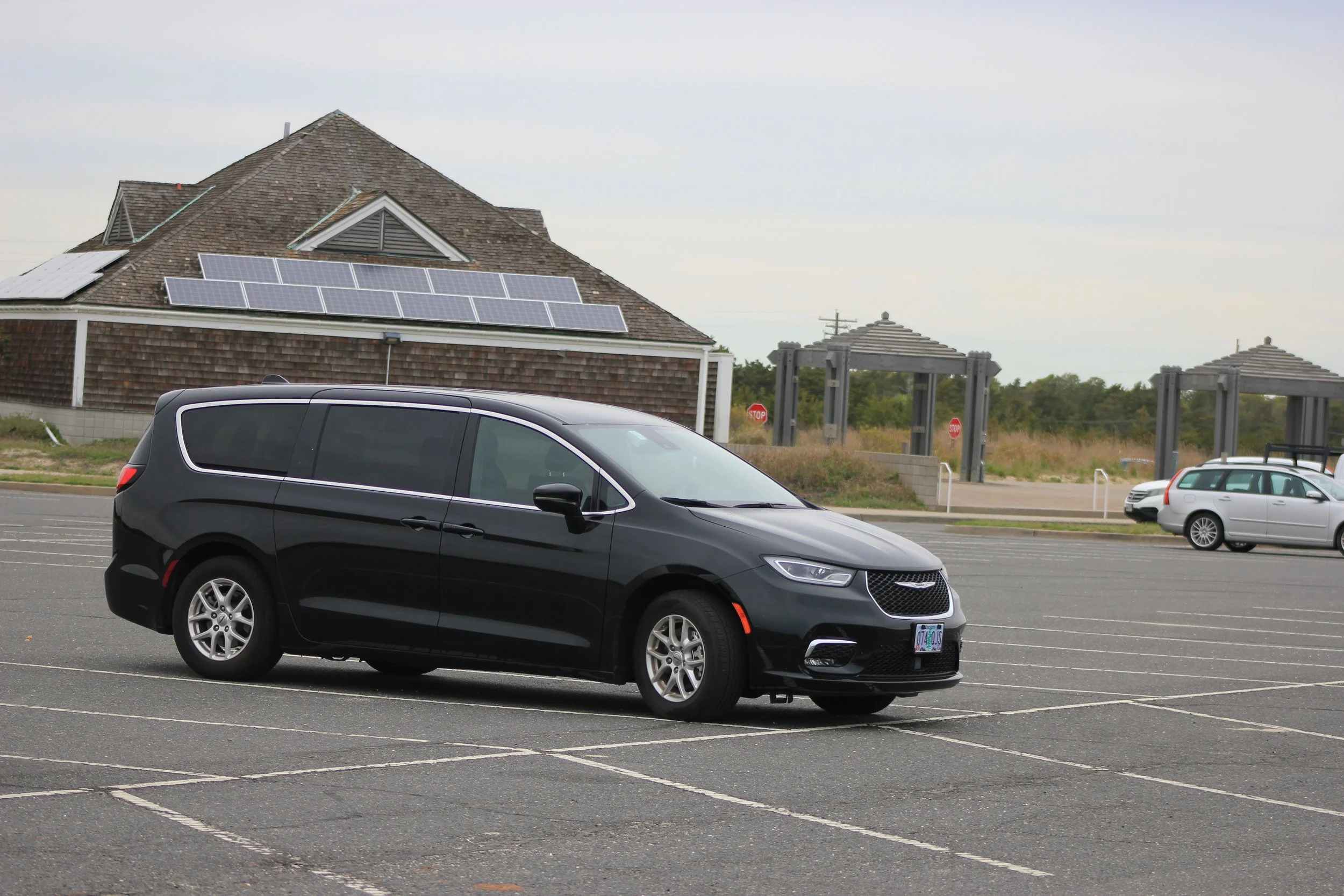 Chrysler Pacifica.  Rental van parked in Sandy Hook in a parking lot.
