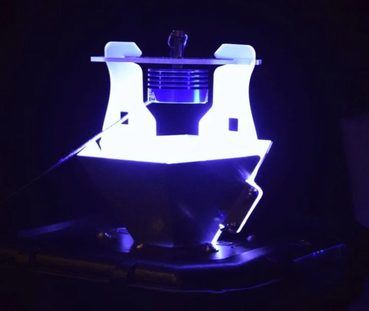 Bug Lantern and trap attachment combined during night time with the lamp illuminated
