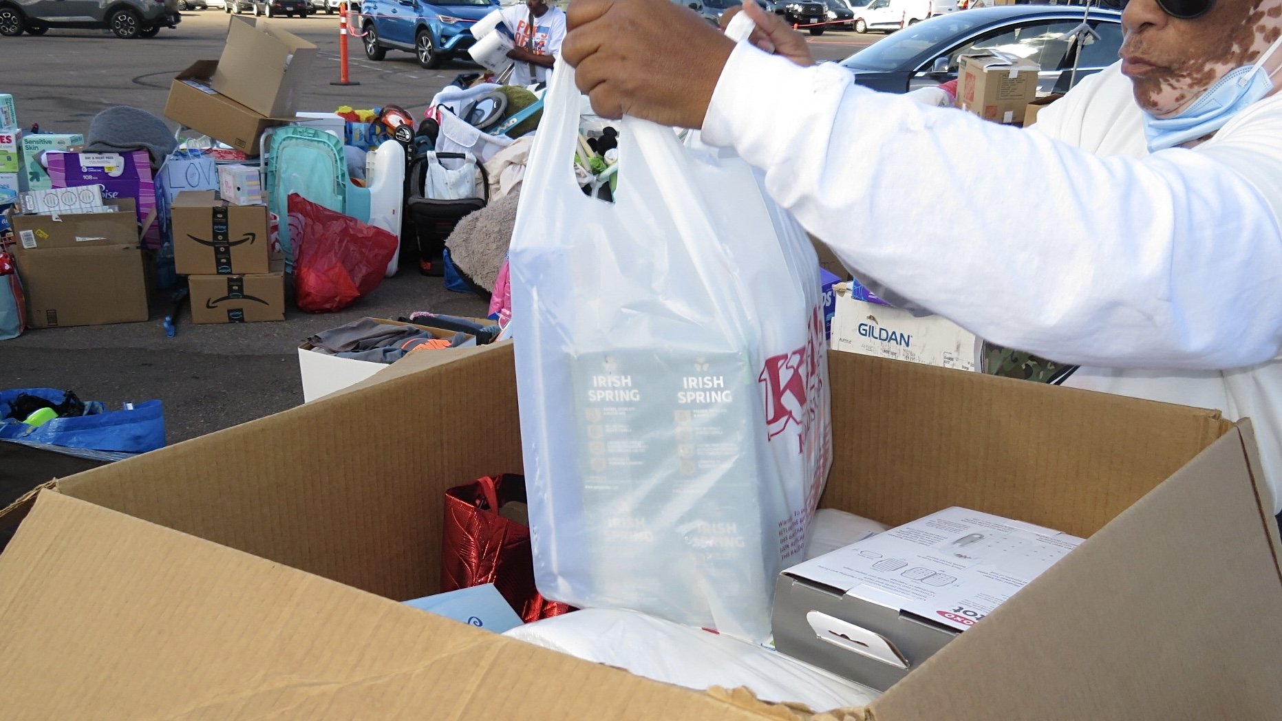 I took these at a donation drive for people affected by the L.A. fires. It was hosted in the Mission Valley Mall parking lot, where cars snaked along to drop off what they could give. The amount of donations that came in was far more than the site ma