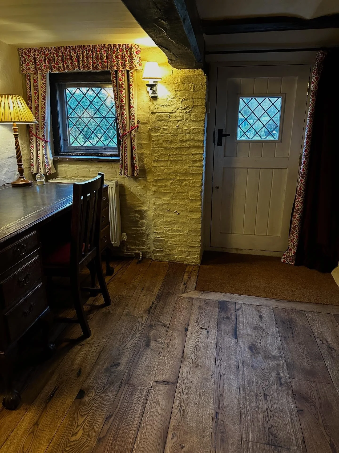 This mixed-width reclaimed oak floor was carefully installed and hand-finished with a smoked oak impact oil, bringing out the deep grain and natural patina of the timber.

The boards were reclaimed from oak buildings aged between 150&ndash;300 years,