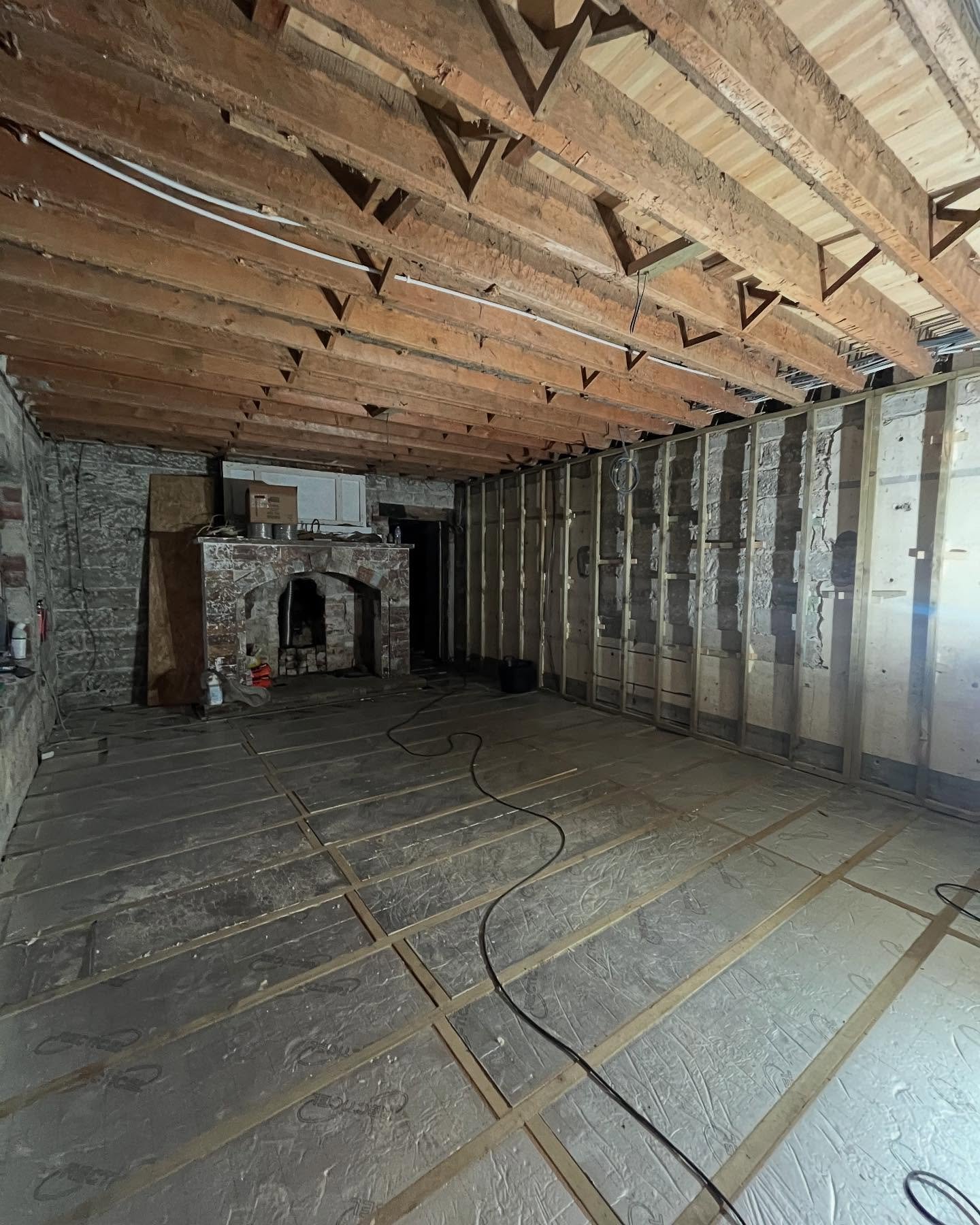 Floors are back in at Ty Bryn. Original floors dug out, footings in and dwarf wall laid for joists. It’s been an interesting job setting out the levels and the fact the newer part of the building is practically on bed rock didn’t give us